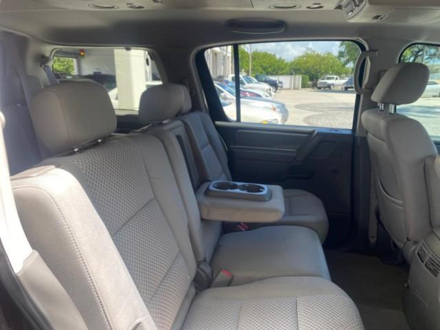 2006 Smoke Metallic /Graphite/Titanium Nissan Armada SE 21 SERVICES NO ACCIDENTS (5N1AA08A96N) with an 5.6L DOHC 32-Valve Endurance V8 Engine engine, Automatic transmission, located at 4701 North Dixie Hwy, Pompano Beach, FL, 33064, (954) 422-2889, 26.240938, -80.123474 - OUR WEBPAGE FLORIDACARS1.COM HAS OVER 100 PHOTOS AND FREE CARFAX LINK 2006 NISSAN ARMADA SE VIN: 5N1AA08A96N736506 5 N 1 A A 0 8 A 9 6 N 7 3 6 5 0 6 4 DOOR WAGON/SPORT UTILITY 5.6L V8 F DOHC 32V GASOLINE REAR WHEEL DRIVE Top Features Alloy Wheels Cloth Seats Fold-Away Third Row Parking Sensors Rear - Photo#98