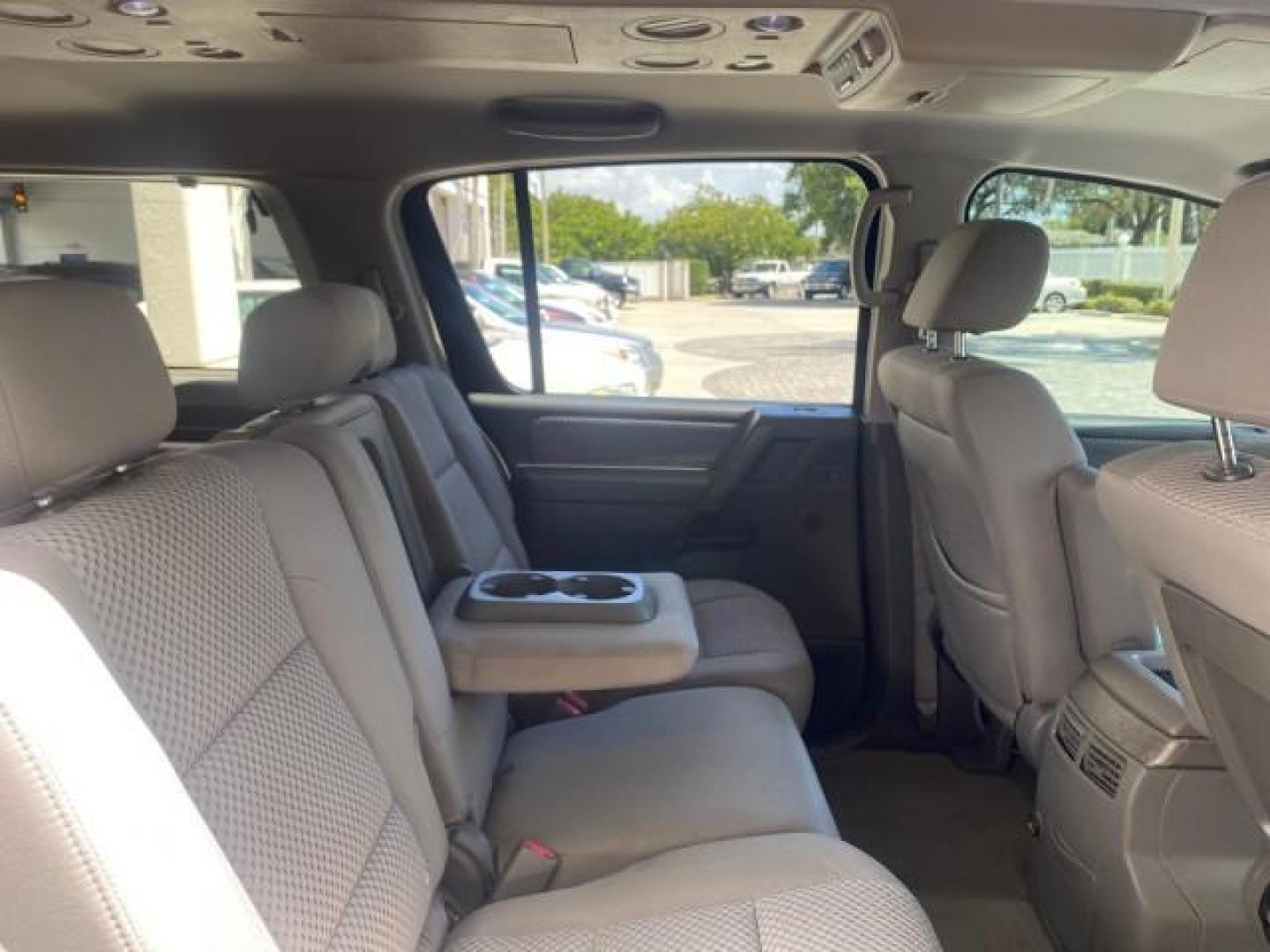2006 Smoke Metallic /Graphite/Titanium Nissan Armada SE 21 SERVICES NO ACCIDENTS (5N1AA08A96N) with an 5.6L DOHC 32-Valve Endurance V8 Engine engine, Automatic transmission, located at 4701 North Dixie Hwy, Pompano Beach, FL, 33064, (954) 422-2889, 26.240938, -80.123474 - OUR WEBPAGE FLORIDACARS1.COM HAS OVER 100 PHOTOS AND FREE CARFAX LINK 2006 NISSAN ARMADA SE VIN: 5N1AA08A96N736506 5 N 1 A A 0 8 A 9 6 N 7 3 6 5 0 6 4 DOOR WAGON/SPORT UTILITY 5.6L V8 F DOHC 32V GASOLINE REAR WHEEL DRIVE Top Features Alloy Wheels Cloth Seats Fold-Away Third Row Parking Sensors Rear - Photo#99