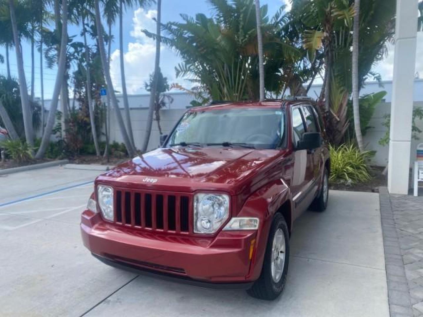 2010 Inferno Red Crystal Pearl /Dark slate gray Jeep Liberty Sport 1 OWNER LOW MILES 46,939 (1J4PP2GK4AW) with an 3.7L V6 Engine engine, Automatic transmission, located at 4701 North Dixie Hwy, Pompano Beach, FL, 33064, (954) 422-2889, 26.240938, -80.123474 - OUR WEBPAGE FLORIDACARS1.COM HAS OVER 100 PHOTOS AND FREE CARFAX LINK 2010 JEEP LIBERTY SPORT VIN: 1J4PP2GK4AW173185 1 J 4 P P 2 G K 4 A W 1 7 3 1 8 5 4 DOOR WAGON/SPORT UTILITY 3.7L V6 F SOHC 12V GASOLINE REAR WHEEL DRIVE Top Features Alloy Wheels Cloth Seats Running Boards Satellite Radio Ready To - Photo#3