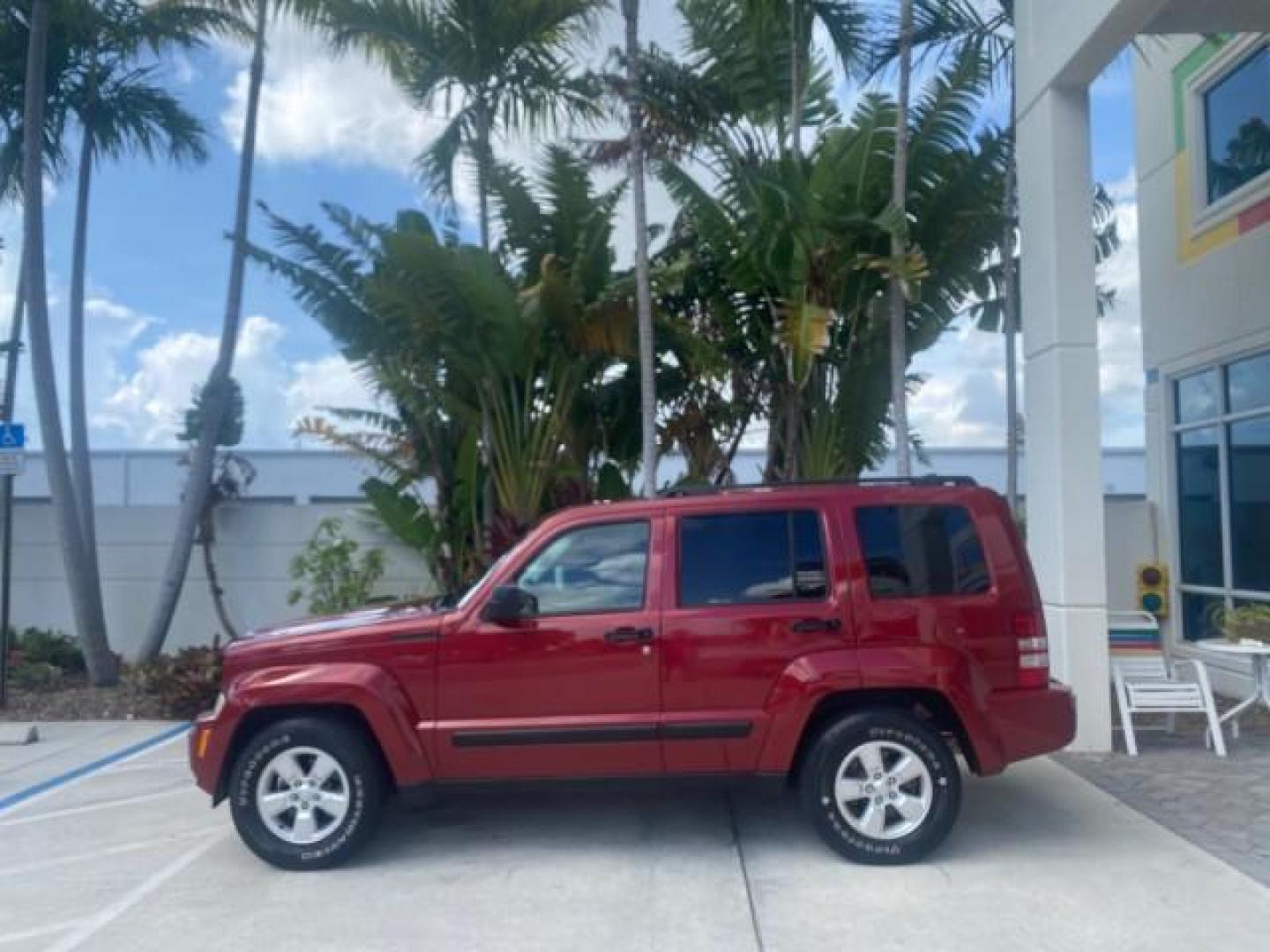 2010 Inferno Red Crystal Pearl /Dark slate gray Jeep Liberty Sport 1 OWNER LOW MILES 46,939 (1J4PP2GK4AW) with an 3.7L V6 Engine engine, Automatic transmission, located at 4701 North Dixie Hwy, Pompano Beach, FL, 33064, (954) 422-2889, 26.240938, -80.123474 - OUR WEBPAGE FLORIDACARS1.COM HAS OVER 100 PHOTOS AND FREE CARFAX LINK 2010 JEEP LIBERTY SPORT VIN: 1J4PP2GK4AW173185 1 J 4 P P 2 G K 4 A W 1 7 3 1 8 5 4 DOOR WAGON/SPORT UTILITY 3.7L V6 F SOHC 12V GASOLINE REAR WHEEL DRIVE Top Features Alloy Wheels Cloth Seats Running Boards Satellite Radio Ready To - Photo#4