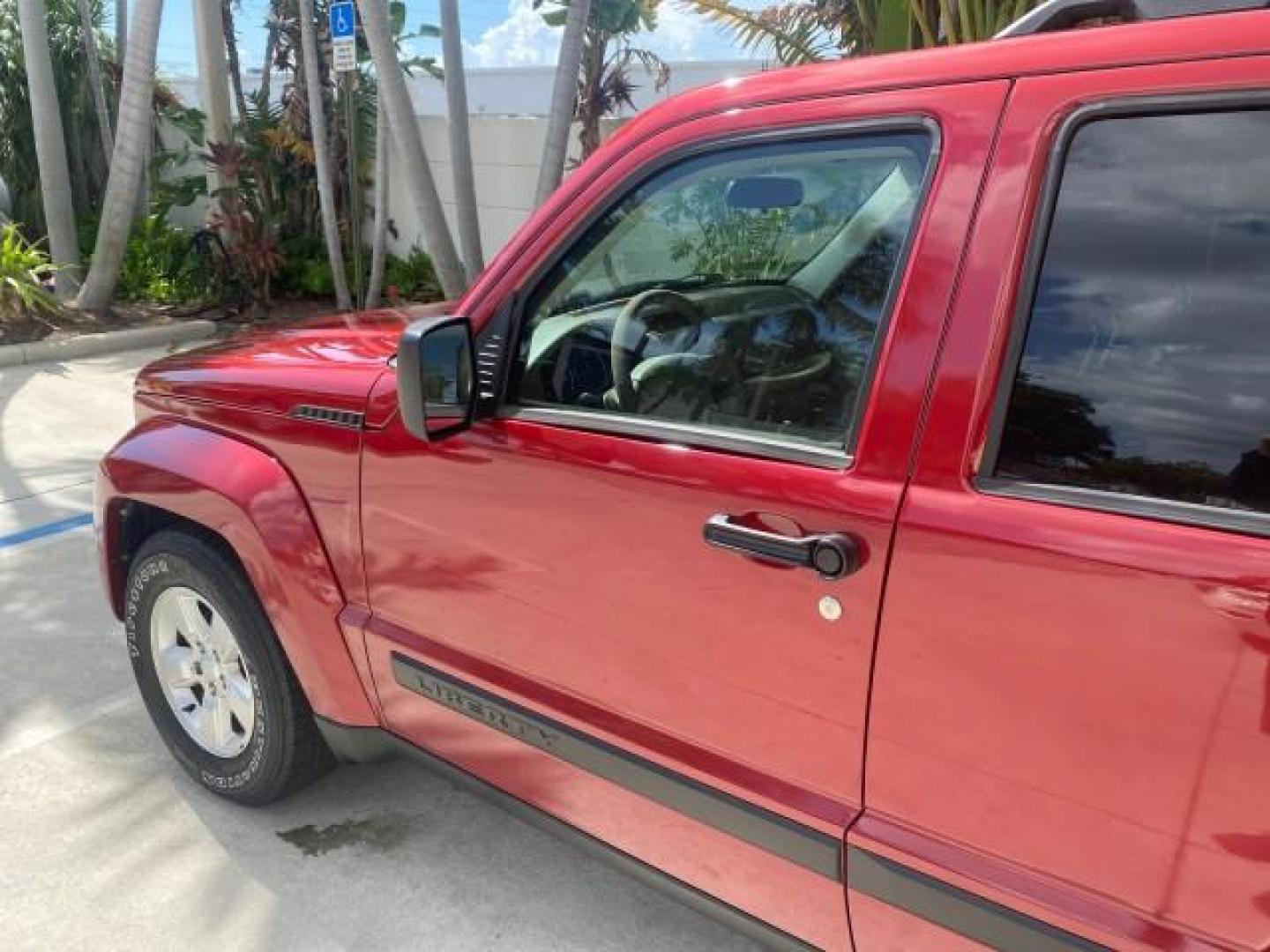 2010 Inferno Red Crystal Pearl /Dark slate gray Jeep Liberty Sport 1 OWNER LOW MILES 46,939 (1J4PP2GK4AW) with an 3.7L V6 Engine engine, Automatic transmission, located at 4701 North Dixie Hwy, Pompano Beach, FL, 33064, (954) 422-2889, 26.240938, -80.123474 - OUR WEBPAGE FLORIDACARS1.COM HAS OVER 100 PHOTOS AND FREE CARFAX LINK 2010 JEEP LIBERTY SPORT VIN: 1J4PP2GK4AW173185 1 J 4 P P 2 G K 4 A W 1 7 3 1 8 5 4 DOOR WAGON/SPORT UTILITY 3.7L V6 F SOHC 12V GASOLINE REAR WHEEL DRIVE Top Features Alloy Wheels Cloth Seats Running Boards Satellite Radio Ready To - Photo#27