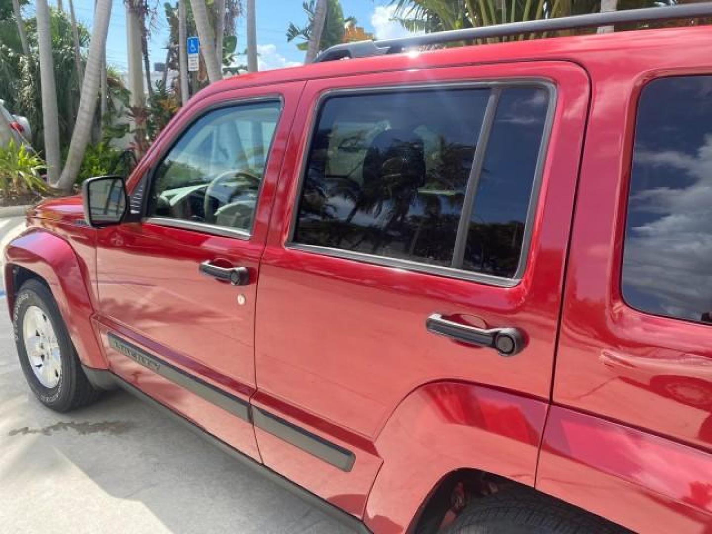 2010 Inferno Red Crystal Pearl /Dark slate gray Jeep Liberty Sport 1 OWNER LOW MILES 46,939 (1J4PP2GK4AW) with an 3.7L V6 Engine engine, Automatic transmission, located at 4701 North Dixie Hwy, Pompano Beach, FL, 33064, (954) 422-2889, 26.240938, -80.123474 - OUR WEBPAGE FLORIDACARS1.COM HAS OVER 100 PHOTOS AND FREE CARFAX LINK 2010 JEEP LIBERTY SPORT VIN: 1J4PP2GK4AW173185 1 J 4 P P 2 G K 4 A W 1 7 3 1 8 5 4 DOOR WAGON/SPORT UTILITY 3.7L V6 F SOHC 12V GASOLINE REAR WHEEL DRIVE Top Features Alloy Wheels Cloth Seats Running Boards Satellite Radio Ready To - Photo#56