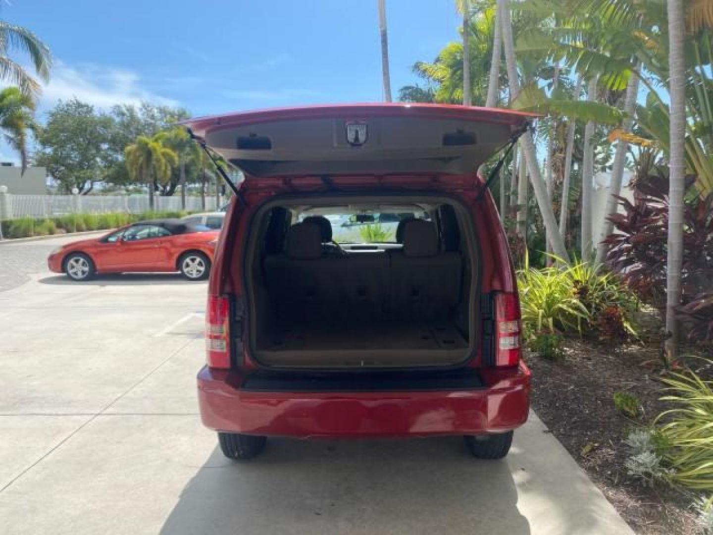 2010 Inferno Red Crystal Pearl /Dark slate gray Jeep Liberty Sport 1 OWNER LOW MILES 46,939 (1J4PP2GK4AW) with an 3.7L V6 Engine engine, Automatic transmission, located at 4701 North Dixie Hwy, Pompano Beach, FL, 33064, (954) 422-2889, 26.240938, -80.123474 - OUR WEBPAGE FLORIDACARS1.COM HAS OVER 100 PHOTOS AND FREE CARFAX LINK 2010 JEEP LIBERTY SPORT VIN: 1J4PP2GK4AW173185 1 J 4 P P 2 G K 4 A W 1 7 3 1 8 5 4 DOOR WAGON/SPORT UTILITY 3.7L V6 F SOHC 12V GASOLINE REAR WHEEL DRIVE Top Features Alloy Wheels Cloth Seats Running Boards Satellite Radio Ready To - Photo#74