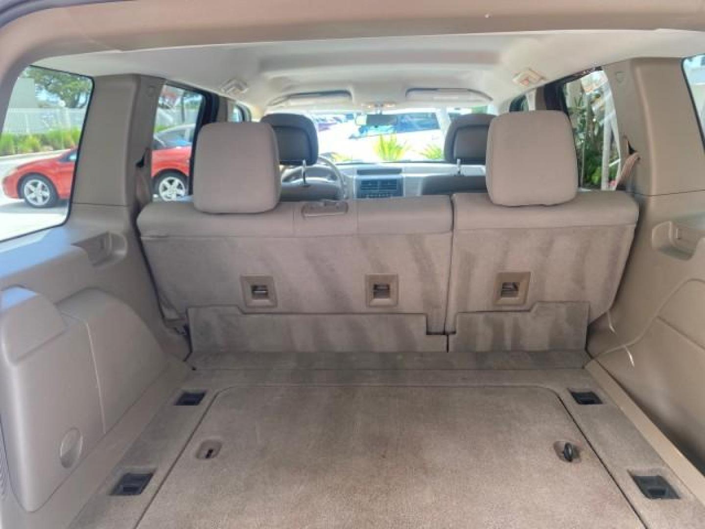 2010 Inferno Red Crystal Pearl /Dark slate gray Jeep Liberty Sport 1 OWNER LOW MILES 46,939 (1J4PP2GK4AW) with an 3.7L V6 Engine engine, Automatic transmission, located at 4701 North Dixie Hwy, Pompano Beach, FL, 33064, (954) 422-2889, 26.240938, -80.123474 - OUR WEBPAGE FLORIDACARS1.COM HAS OVER 100 PHOTOS AND FREE CARFAX LINK 2010 JEEP LIBERTY SPORT VIN: 1J4PP2GK4AW173185 1 J 4 P P 2 G K 4 A W 1 7 3 1 8 5 4 DOOR WAGON/SPORT UTILITY 3.7L V6 F SOHC 12V GASOLINE REAR WHEEL DRIVE Top Features Alloy Wheels Cloth Seats Running Boards Satellite Radio Ready To - Photo#76