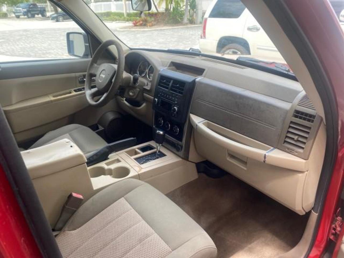 2010 Inferno Red Crystal Pearl /Dark slate gray Jeep Liberty Sport 1 OWNER LOW MILES 46,939 (1J4PP2GK4AW) with an 3.7L V6 Engine engine, Automatic transmission, located at 4701 North Dixie Hwy, Pompano Beach, FL, 33064, (954) 422-2889, 26.240938, -80.123474 - OUR WEBPAGE FLORIDACARS1.COM HAS OVER 100 PHOTOS AND FREE CARFAX LINK 2010 JEEP LIBERTY SPORT VIN: 1J4PP2GK4AW173185 1 J 4 P P 2 G K 4 A W 1 7 3 1 8 5 4 DOOR WAGON/SPORT UTILITY 3.7L V6 F SOHC 12V GASOLINE REAR WHEEL DRIVE Top Features Alloy Wheels Cloth Seats Running Boards Satellite Radio Ready To - Photo#94