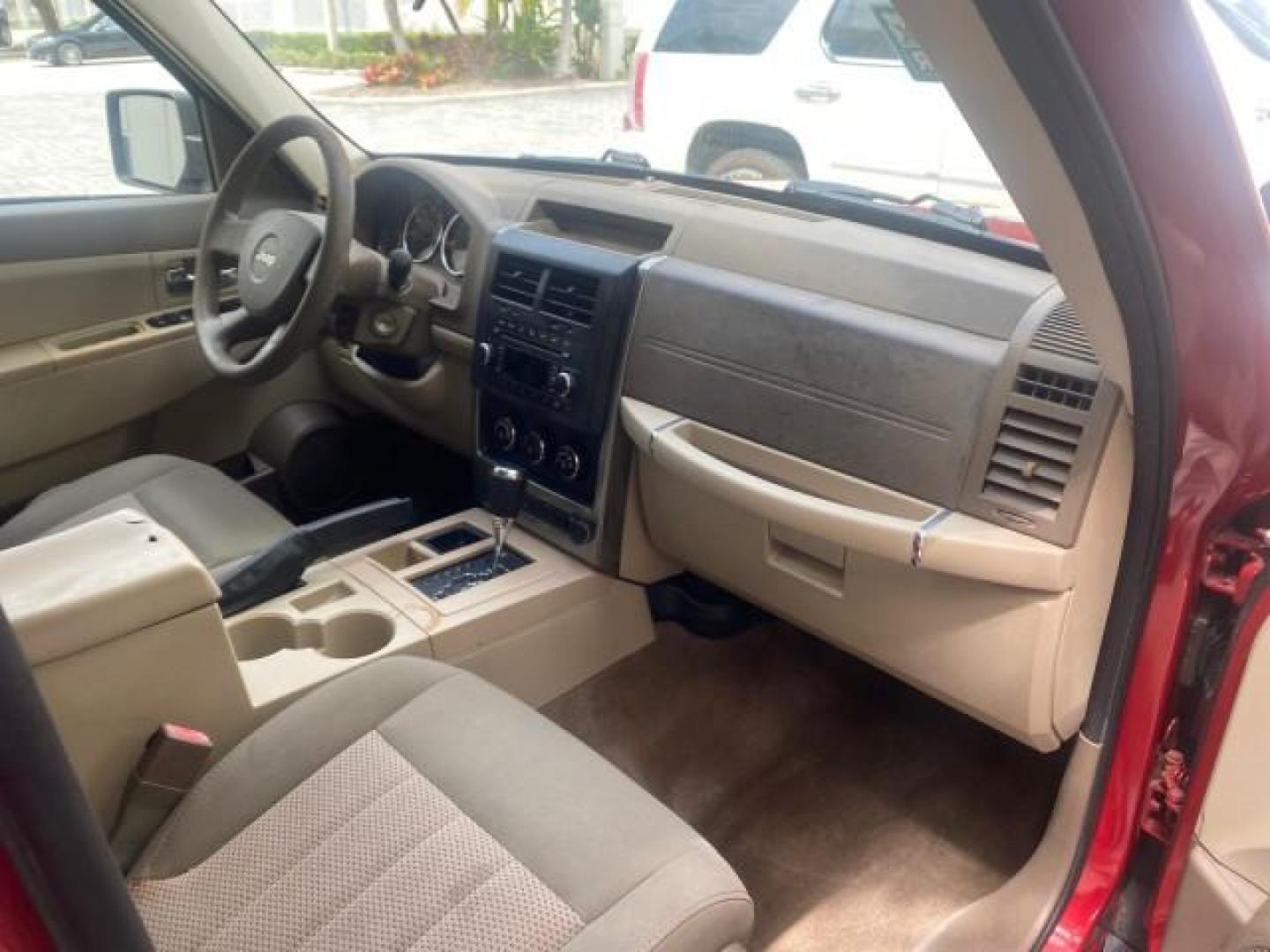 2010 Inferno Red Crystal Pearl /Dark slate gray Jeep Liberty Sport 1 OWNER LOW MILES 46,939 (1J4PP2GK4AW) with an 3.7L V6 Engine engine, Automatic transmission, located at 4701 North Dixie Hwy, Pompano Beach, FL, 33064, (954) 422-2889, 26.240938, -80.123474 - OUR WEBPAGE FLORIDACARS1.COM HAS OVER 100 PHOTOS AND FREE CARFAX LINK 2010 JEEP LIBERTY SPORT VIN: 1J4PP2GK4AW173185 1 J 4 P P 2 G K 4 A W 1 7 3 1 8 5 4 DOOR WAGON/SPORT UTILITY 3.7L V6 F SOHC 12V GASOLINE REAR WHEEL DRIVE Top Features Alloy Wheels Cloth Seats Running Boards Satellite Radio Ready To - Photo#95