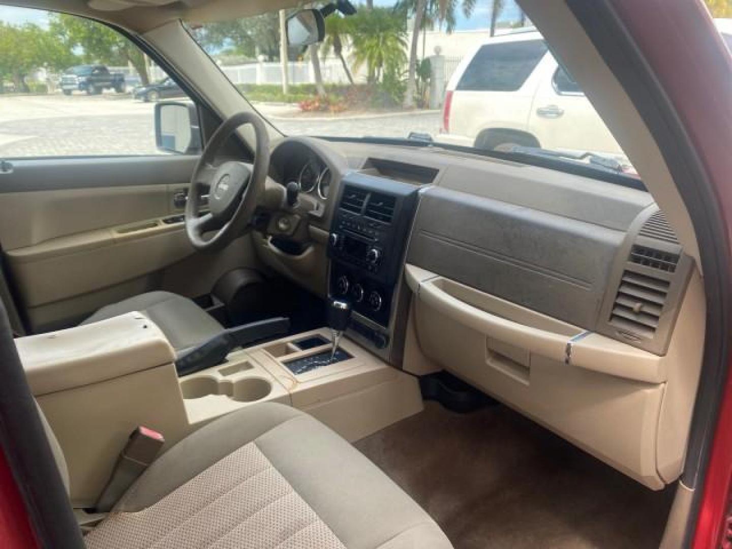 2010 Inferno Red Crystal Pearl /Dark slate gray Jeep Liberty Sport 1 OWNER LOW MILES 46,939 (1J4PP2GK4AW) with an 3.7L V6 Engine engine, Automatic transmission, located at 4701 North Dixie Hwy, Pompano Beach, FL, 33064, (954) 422-2889, 26.240938, -80.123474 - OUR WEBPAGE FLORIDACARS1.COM HAS OVER 100 PHOTOS AND FREE CARFAX LINK 2010 JEEP LIBERTY SPORT VIN: 1J4PP2GK4AW173185 1 J 4 P P 2 G K 4 A W 1 7 3 1 8 5 4 DOOR WAGON/SPORT UTILITY 3.7L V6 F SOHC 12V GASOLINE REAR WHEEL DRIVE Top Features Alloy Wheels Cloth Seats Running Boards Satellite Radio Ready To - Photo#96