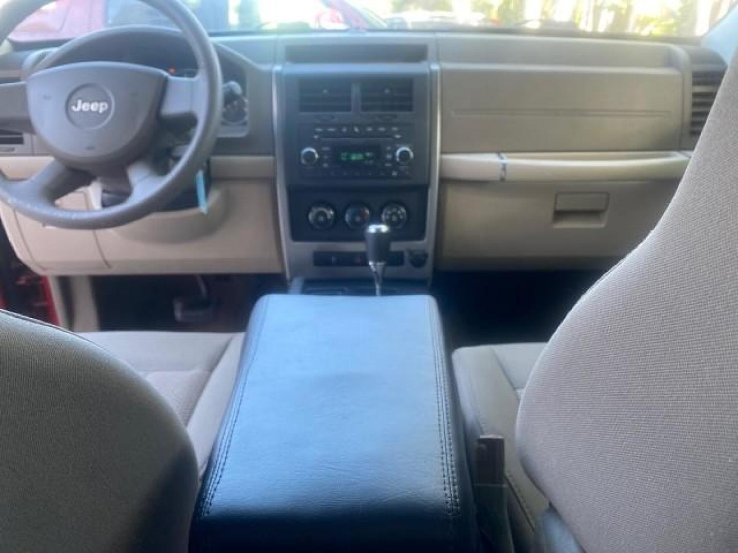 2010 Inferno Red Crystal Pearl /Dark slate gray Jeep Liberty Sport 1 OWNER LOW MILES 46,942 (1J4PP2GK4AW) with an 3.7L V6 Engine engine, Automatic transmission, located at 4701 North Dixie Hwy, Pompano Beach, FL, 33064, (954) 422-2889, 26.240938, -80.123474 - OUR WEBPAGE FLORIDACARS1.COM HAS OVER 100 PHOTOS AND FREE CARFAX LINK 2010 JEEP LIBERTY SPORT VIN: 1J4PP2GK4AW173185 1 J 4 P P 2 G K 4 A W 1 7 3 1 8 5 4 DOOR WAGON/SPORT UTILITY 3.7L V6 F SOHC 12V GASOLINE REAR WHEEL DRIVE Top Features Alloy Wheels Cloth Seats Running Boards Satellite Radio Ready To - Photo#67