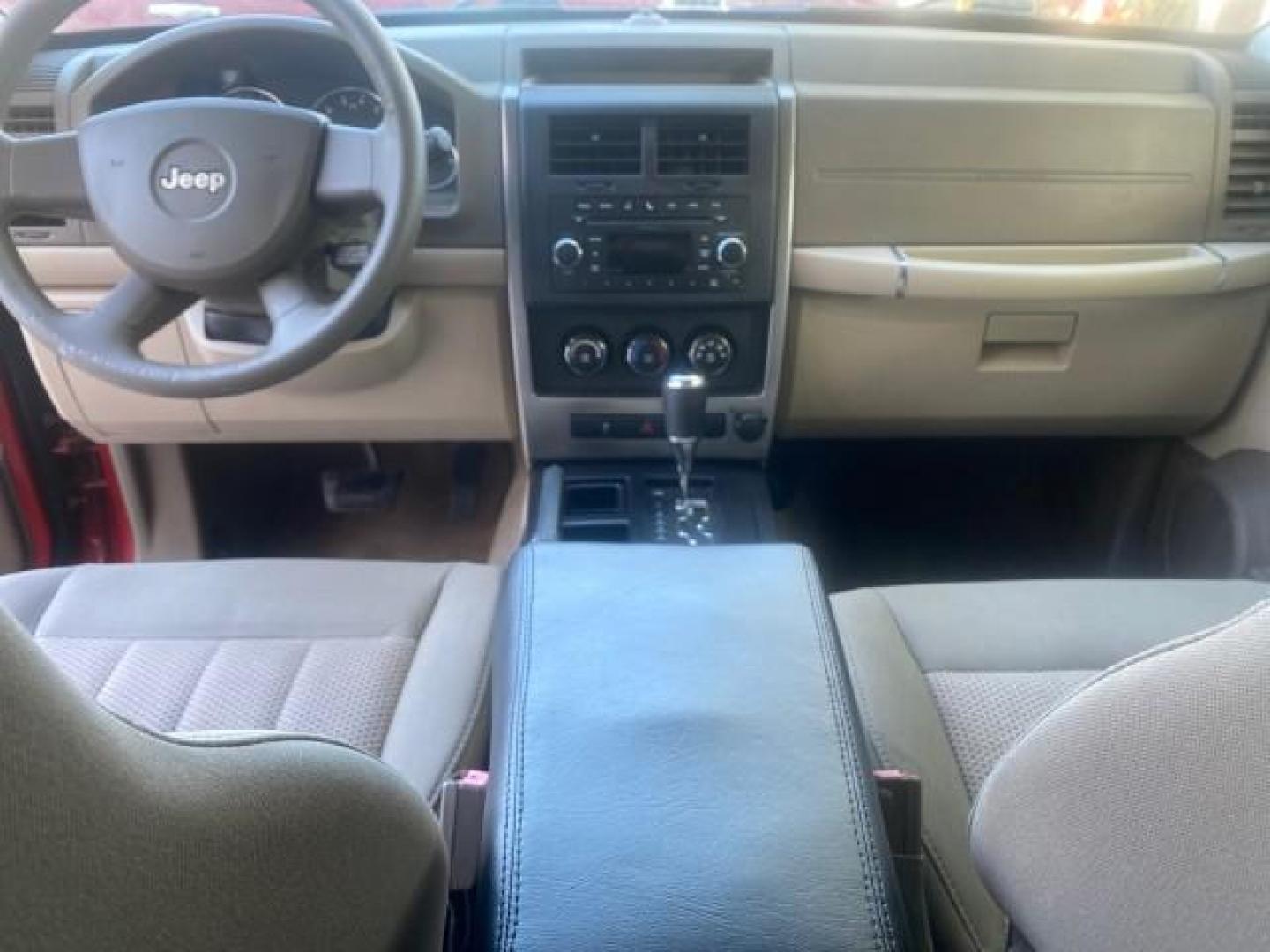 2010 Inferno Red Crystal Pearl /Dark slate gray Jeep Liberty Sport 1 OWNER LOW MILES 46,942 (1J4PP2GK4AW) with an 3.7L V6 Engine engine, Automatic transmission, located at 4701 North Dixie Hwy, Pompano Beach, FL, 33064, (954) 422-2889, 26.240938, -80.123474 - OUR WEBPAGE FLORIDACARS1.COM HAS OVER 100 PHOTOS AND FREE CARFAX LINK 2010 JEEP LIBERTY SPORT VIN: 1J4PP2GK4AW173185 1 J 4 P P 2 G K 4 A W 1 7 3 1 8 5 4 DOOR WAGON/SPORT UTILITY 3.7L V6 F SOHC 12V GASOLINE REAR WHEEL DRIVE Top Features Alloy Wheels Cloth Seats Running Boards Satellite Radio Ready To - Photo#68