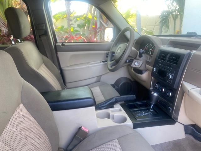2010 Inferno Red Crystal Pearl /Dark slate gray Jeep Liberty Sport 1 OWNER LOW MILES 46,942 (1J4PP2GK4AW) with an 3.7L V6 Engine engine, Automatic transmission, located at 4701 North Dixie Hwy, Pompano Beach, FL, 33064, (954) 422-2889, 26.240938, -80.123474 - OUR WEBPAGE FLORIDACARS1.COM HAS OVER 100 PHOTOS AND FREE CARFAX LINK 2010 JEEP LIBERTY SPORT VIN: 1J4PP2GK4AW173185 1 J 4 P P 2 G K 4 A W 1 7 3 1 8 5 4 DOOR WAGON/SPORT UTILITY 3.7L V6 F SOHC 12V GASOLINE REAR WHEEL DRIVE Top Features Alloy Wheels Cloth Seats Running Boards Satellite Radio Ready To - Photo#98