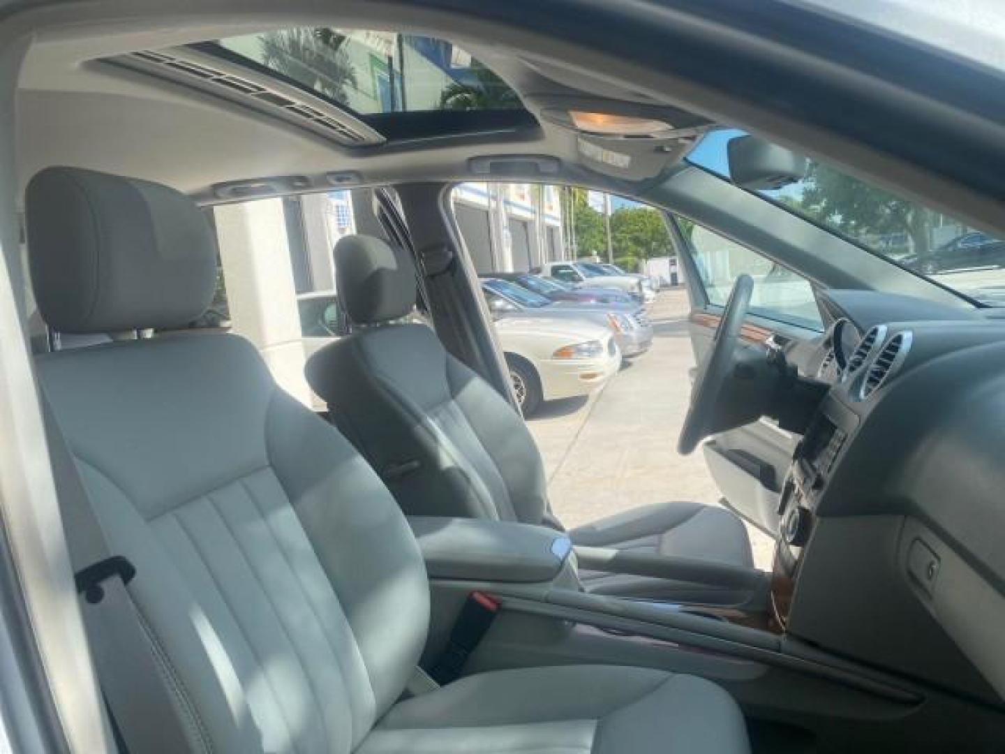 2008 Iridium Silver Metallic /Ash Mercedes-Benz M-Class 3.5L 1 OWNER LOW MILES 48,488 (4JGBB86E68A) with an 3.5L DOHC 24-Valve V6 Engine engine, Automatic transmission, located at 4701 North Dixie Hwy, Pompano Beach, FL, 33064, (954) 422-2889, 26.240938, -80.123474 - OUR WEBPAGE FLORIDACARS1.COM HAS OVER 100 PHOTOS AND FREE CARFAX LINK 2008 MERCEDES-BENZ M-CLASS ML 350 VIN: 4JGBB86E68A369175 4 J G B B 8 6 E 6 8 A 3 6 9 1 7 5 4 DOOR WAGON/SPORT UTILITY 3.5L V6 F DOHC 24V GASOLINE ALL WHEEL DRIVE Top Features 4WD/AWD Alloy Wheels Automated Cruise Control Front Sea - Photo#12
