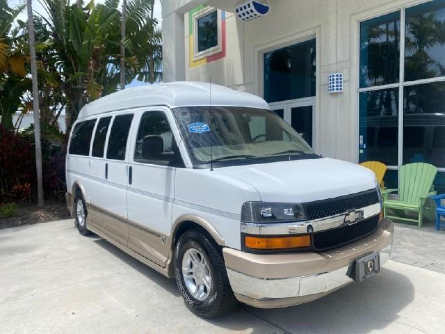 2003 Summit White /Medium Pewter Chevrolet Express HI TOP CONVERSION EXPLOR LOW MILES 55,452 (1GBFG15T331) with an 5.3L Vortec 5300 V8 SFI Engine engine, Automatic transmission, located at 4701 North Dixie Hwy, Pompano Beach, FL, 33064, (954) 422-2889, 26.240938, -80.123474 - OUR WEBPAGE FLORIDACARS1.COM HAS OVER 100 PHOTOS AND FREE CARFAX LINK OVER $ 90,000 NEW 2003 CHEVROLET EXPRESS G1500 LIMITED EXPLORER HI TOP CONVERSION VIN: 1GBFG15T331235672 1 G B F G 1 5 T 3 3 1 2 3 5 6 7 2 VAN 5.3L V8 F OHV GASOLINE REAR WHEEL DRIVE Top Features Alloy Wheels Conversion Van Fold-A - Photo#1