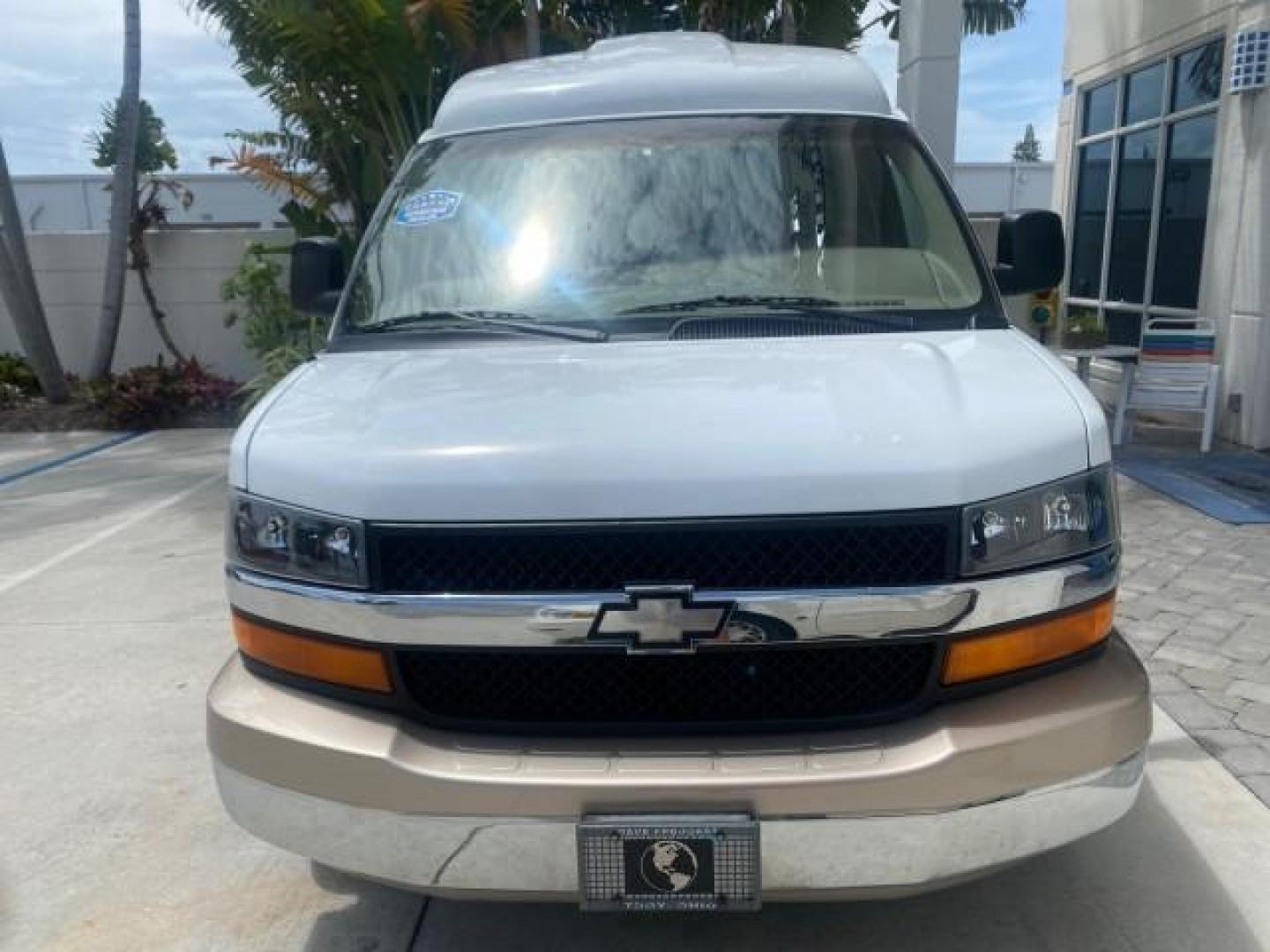 2003 Summit White /Medium Pewter Chevrolet Express HI TOP CONVERSION EXPLOR LOW MILES 55,452 (1GBFG15T331) with an 5.3L Vortec 5300 V8 SFI Engine engine, Automatic transmission, located at 4701 North Dixie Hwy, Pompano Beach, FL, 33064, (954) 422-2889, 26.240938, -80.123474 - OUR WEBPAGE FLORIDACARS1.COM HAS OVER 100 PHOTOS AND FREE CARFAX LINK OVER $ 90,000 NEW 2003 CHEVROLET EXPRESS G1500 LIMITED EXPLORER HI TOP CONVERSION VIN: 1GBFG15T331235672 1 G B F G 1 5 T 3 3 1 2 3 5 6 7 2 VAN 5.3L V8 F OHV GASOLINE REAR WHEEL DRIVE Top Features Alloy Wheels Conversion Van Fold-A - Photo#2