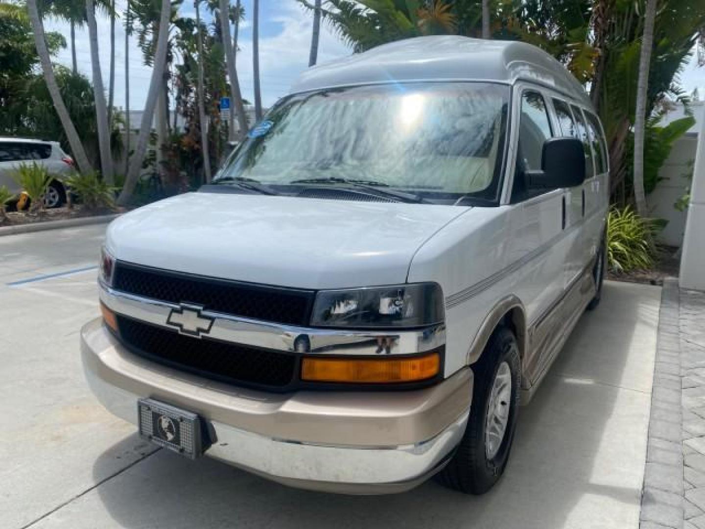 2003 Summit White /Medium Pewter Chevrolet Express HI TOP CONVERSION EXPLOR LOW MILES 55,452 (1GBFG15T331) with an 5.3L Vortec 5300 V8 SFI Engine engine, Automatic transmission, located at 4701 North Dixie Hwy, Pompano Beach, FL, 33064, (954) 422-2889, 26.240938, -80.123474 - OUR WEBPAGE FLORIDACARS1.COM HAS OVER 100 PHOTOS AND FREE CARFAX LINK OVER $ 90,000 NEW 2003 CHEVROLET EXPRESS G1500 LIMITED EXPLORER HI TOP CONVERSION VIN: 1GBFG15T331235672 1 G B F G 1 5 T 3 3 1 2 3 5 6 7 2 VAN 5.3L V8 F OHV GASOLINE REAR WHEEL DRIVE Top Features Alloy Wheels Conversion Van Fold-A - Photo#3