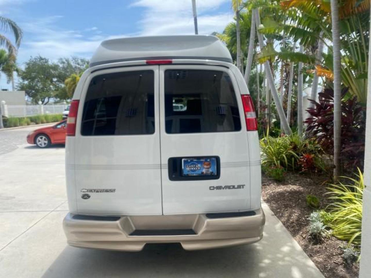 2003 Summit White /Medium Pewter Chevrolet Express HI TOP CONVERSION EXPLOR LOW MILES 55,452 (1GBFG15T331) with an 5.3L Vortec 5300 V8 SFI Engine engine, Automatic transmission, located at 4701 North Dixie Hwy, Pompano Beach, FL, 33064, (954) 422-2889, 26.240938, -80.123474 - OUR WEBPAGE FLORIDACARS1.COM HAS OVER 100 PHOTOS AND FREE CARFAX LINK OVER $ 90,000 NEW 2003 CHEVROLET EXPRESS G1500 LIMITED EXPLORER HI TOP CONVERSION VIN: 1GBFG15T331235672 1 G B F G 1 5 T 3 3 1 2 3 5 6 7 2 VAN 5.3L V8 F OHV GASOLINE REAR WHEEL DRIVE Top Features Alloy Wheels Conversion Van Fold-A - Photo#6