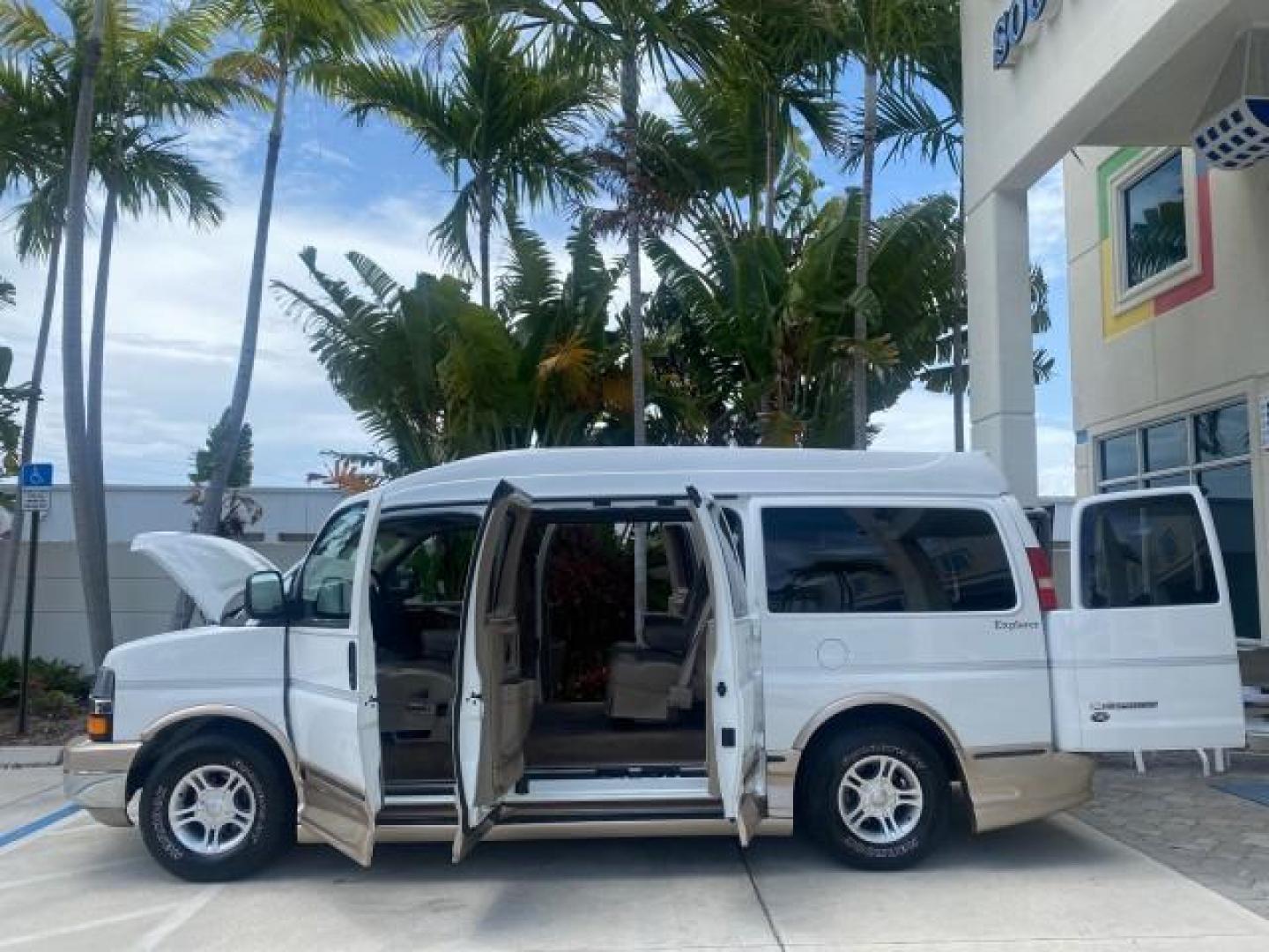 2003 Summit White /Medium Pewter Chevrolet Express HI TOP CONVERSION EXPLOR LOW MILES 55,452 (1GBFG15T331) with an 5.3L Vortec 5300 V8 SFI Engine engine, Automatic transmission, located at 4701 North Dixie Hwy, Pompano Beach, FL, 33064, (954) 422-2889, 26.240938, -80.123474 - OUR WEBPAGE FLORIDACARS1.COM HAS OVER 100 PHOTOS AND FREE CARFAX LINK OVER $ 90,000 NEW 2003 CHEVROLET EXPRESS G1500 LIMITED EXPLORER HI TOP CONVERSION VIN: 1GBFG15T331235672 1 G B F G 1 5 T 3 3 1 2 3 5 6 7 2 VAN 5.3L V8 F OHV GASOLINE REAR WHEEL DRIVE Top Features Alloy Wheels Conversion Van Fold-A - Photo#8
