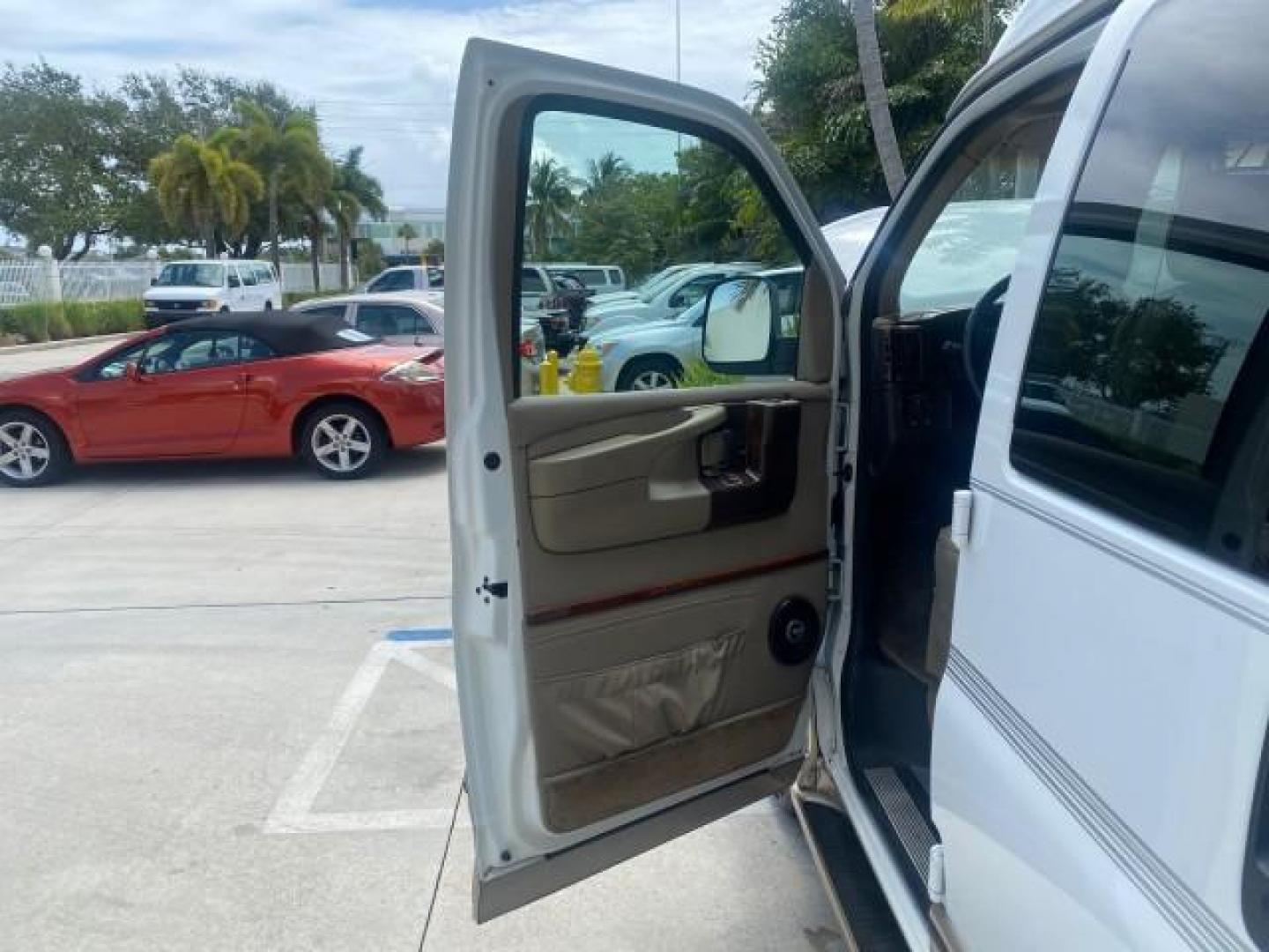 2003 Summit White /Medium Pewter Chevrolet Express HI TOP CONVERSION EXPLOR LOW MILES 55,452 (1GBFG15T331) with an 5.3L Vortec 5300 V8 SFI Engine engine, Automatic transmission, located at 4701 North Dixie Hwy, Pompano Beach, FL, 33064, (954) 422-2889, 26.240938, -80.123474 - OUR WEBPAGE FLORIDACARS1.COM HAS OVER 100 PHOTOS AND FREE CARFAX LINK OVER $ 90,000 NEW 2003 CHEVROLET EXPRESS G1500 LIMITED EXPLORER HI TOP CONVERSION VIN: 1GBFG15T331235672 1 G B F G 1 5 T 3 3 1 2 3 5 6 7 2 VAN 5.3L V8 F OHV GASOLINE REAR WHEEL DRIVE Top Features Alloy Wheels Conversion Van Fold-A - Photo#9