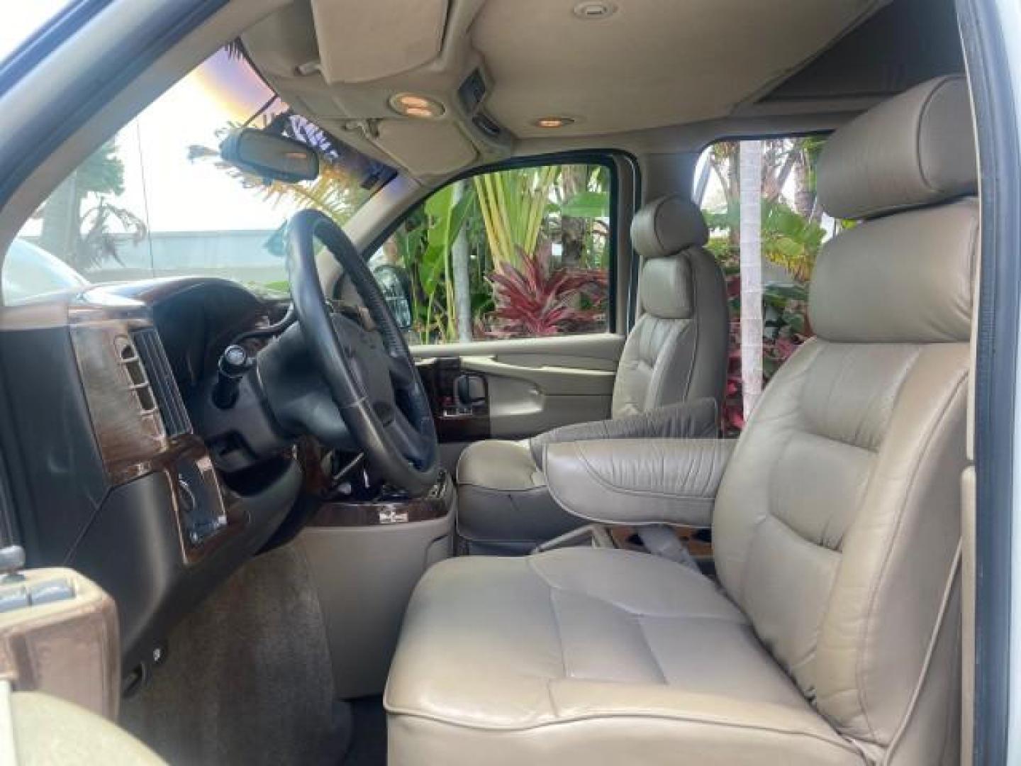 2003 Summit White /Medium Pewter Chevrolet Express HI TOP CONVERSION EXPLOR LOW MILES 55,452 (1GBFG15T331) with an 5.3L Vortec 5300 V8 SFI Engine engine, Automatic transmission, located at 4701 North Dixie Hwy, Pompano Beach, FL, 33064, (954) 422-2889, 26.240938, -80.123474 - OUR WEBPAGE FLORIDACARS1.COM HAS OVER 100 PHOTOS AND FREE CARFAX LINK OVER $ 90,000 NEW 2003 CHEVROLET EXPRESS G1500 LIMITED EXPLORER HI TOP CONVERSION VIN: 1GBFG15T331235672 1 G B F G 1 5 T 3 3 1 2 3 5 6 7 2 VAN 5.3L V8 F OHV GASOLINE REAR WHEEL DRIVE Top Features Alloy Wheels Conversion Van Fold-A - Photo#10