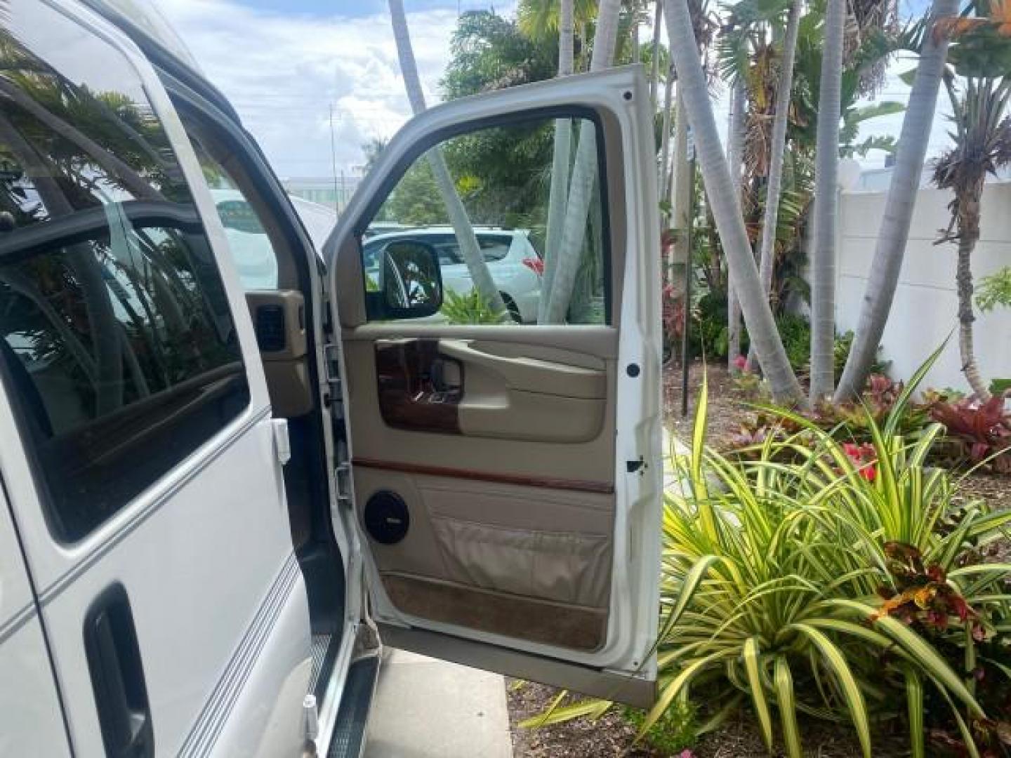 2003 Summit White /Medium Pewter Chevrolet Express HI TOP CONVERSION EXPLOR LOW MILES 55,452 (1GBFG15T331) with an 5.3L Vortec 5300 V8 SFI Engine engine, Automatic transmission, located at 4701 North Dixie Hwy, Pompano Beach, FL, 33064, (954) 422-2889, 26.240938, -80.123474 - OUR WEBPAGE FLORIDACARS1.COM HAS OVER 100 PHOTOS AND FREE CARFAX LINK OVER $ 90,000 NEW 2003 CHEVROLET EXPRESS G1500 LIMITED EXPLORER HI TOP CONVERSION VIN: 1GBFG15T331235672 1 G B F G 1 5 T 3 3 1 2 3 5 6 7 2 VAN 5.3L V8 F OHV GASOLINE REAR WHEEL DRIVE Top Features Alloy Wheels Conversion Van Fold-A - Photo#11