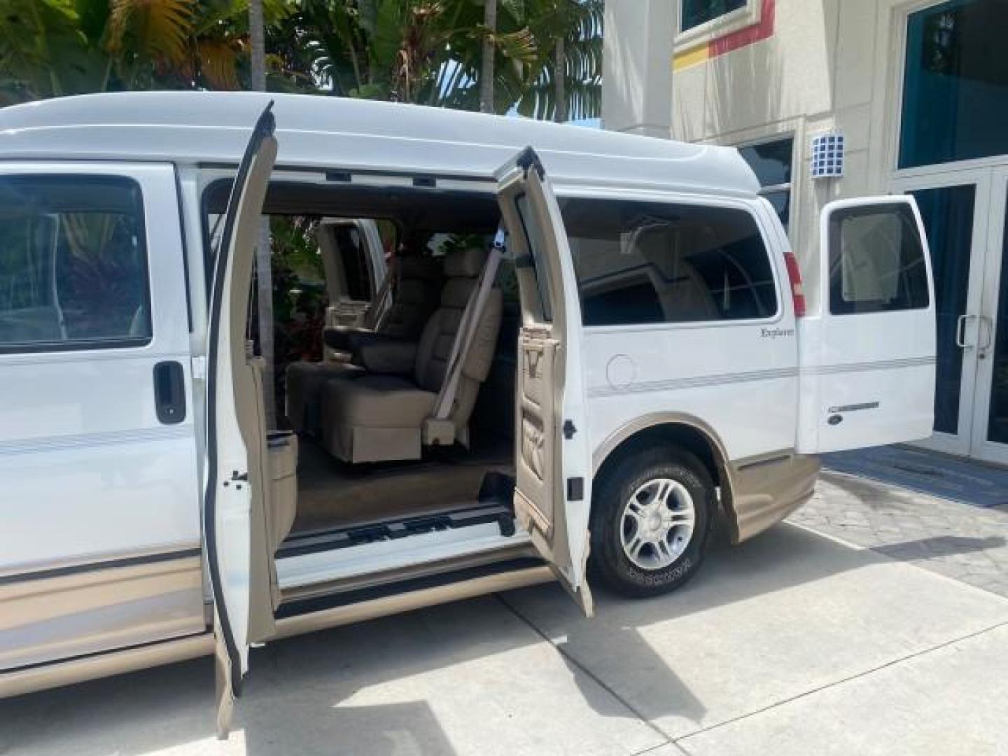 2003 Summit White /Medium Pewter Chevrolet Express HI TOP CONVERSION EXPLOR LOW MILES 55,452 (1GBFG15T331) with an 5.3L Vortec 5300 V8 SFI Engine engine, Automatic transmission, located at 4701 North Dixie Hwy, Pompano Beach, FL, 33064, (954) 422-2889, 26.240938, -80.123474 - OUR WEBPAGE FLORIDACARS1.COM HAS OVER 100 PHOTOS AND FREE CARFAX LINK OVER $ 90,000 NEW 2003 CHEVROLET EXPRESS G1500 LIMITED EXPLORER HI TOP CONVERSION VIN: 1GBFG15T331235672 1 G B F G 1 5 T 3 3 1 2 3 5 6 7 2 VAN 5.3L V8 F OHV GASOLINE REAR WHEEL DRIVE Top Features Alloy Wheels Conversion Van Fold-A - Photo#13