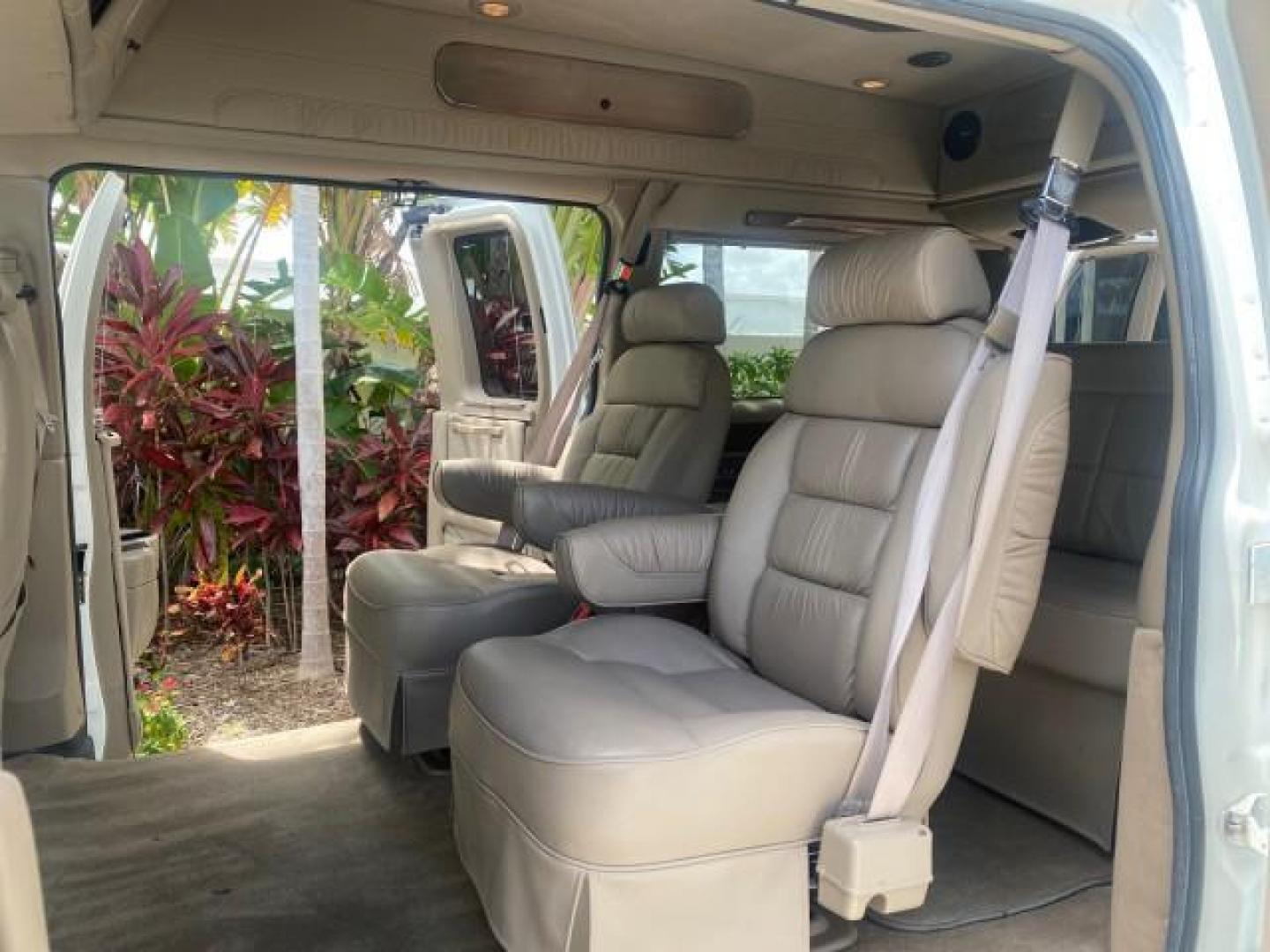 2003 Summit White /Medium Pewter Chevrolet Express HI TOP CONVERSION EXPLOR LOW MILES 55,452 (1GBFG15T331) with an 5.3L Vortec 5300 V8 SFI Engine engine, Automatic transmission, located at 4701 North Dixie Hwy, Pompano Beach, FL, 33064, (954) 422-2889, 26.240938, -80.123474 - OUR WEBPAGE FLORIDACARS1.COM HAS OVER 100 PHOTOS AND FREE CARFAX LINK OVER $ 90,000 NEW 2003 CHEVROLET EXPRESS G1500 LIMITED EXPLORER HI TOP CONVERSION VIN: 1GBFG15T331235672 1 G B F G 1 5 T 3 3 1 2 3 5 6 7 2 VAN 5.3L V8 F OHV GASOLINE REAR WHEEL DRIVE Top Features Alloy Wheels Conversion Van Fold-A - Photo#14