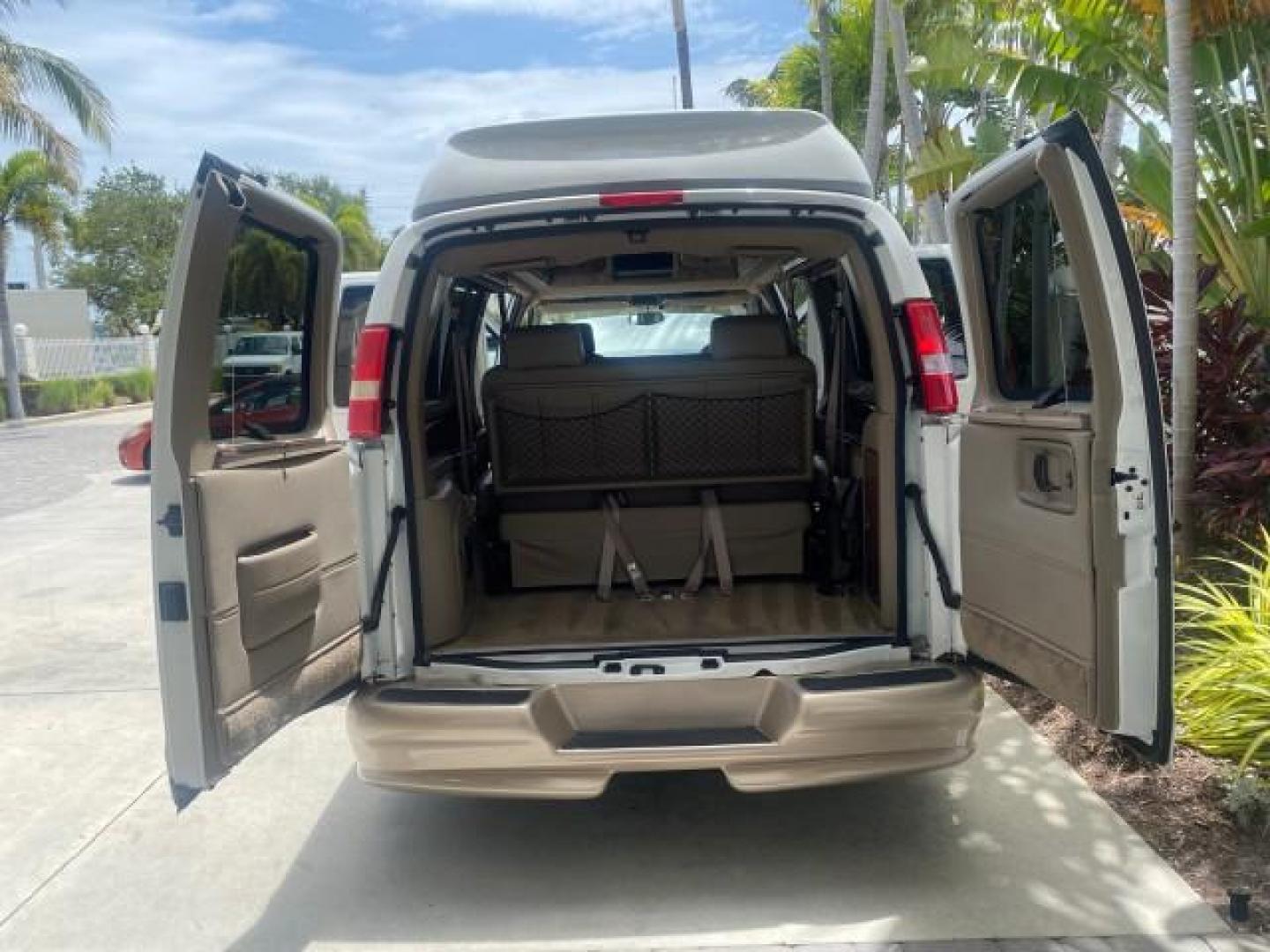 2003 Summit White /Medium Pewter Chevrolet Express HI TOP CONVERSION EXPLOR LOW MILES 55,452 (1GBFG15T331) with an 5.3L Vortec 5300 V8 SFI Engine engine, Automatic transmission, located at 4701 North Dixie Hwy, Pompano Beach, FL, 33064, (954) 422-2889, 26.240938, -80.123474 - OUR WEBPAGE FLORIDACARS1.COM HAS OVER 100 PHOTOS AND FREE CARFAX LINK OVER $ 90,000 NEW 2003 CHEVROLET EXPRESS G1500 LIMITED EXPLORER HI TOP CONVERSION VIN: 1GBFG15T331235672 1 G B F G 1 5 T 3 3 1 2 3 5 6 7 2 VAN 5.3L V8 F OHV GASOLINE REAR WHEEL DRIVE Top Features Alloy Wheels Conversion Van Fold-A - Photo#15