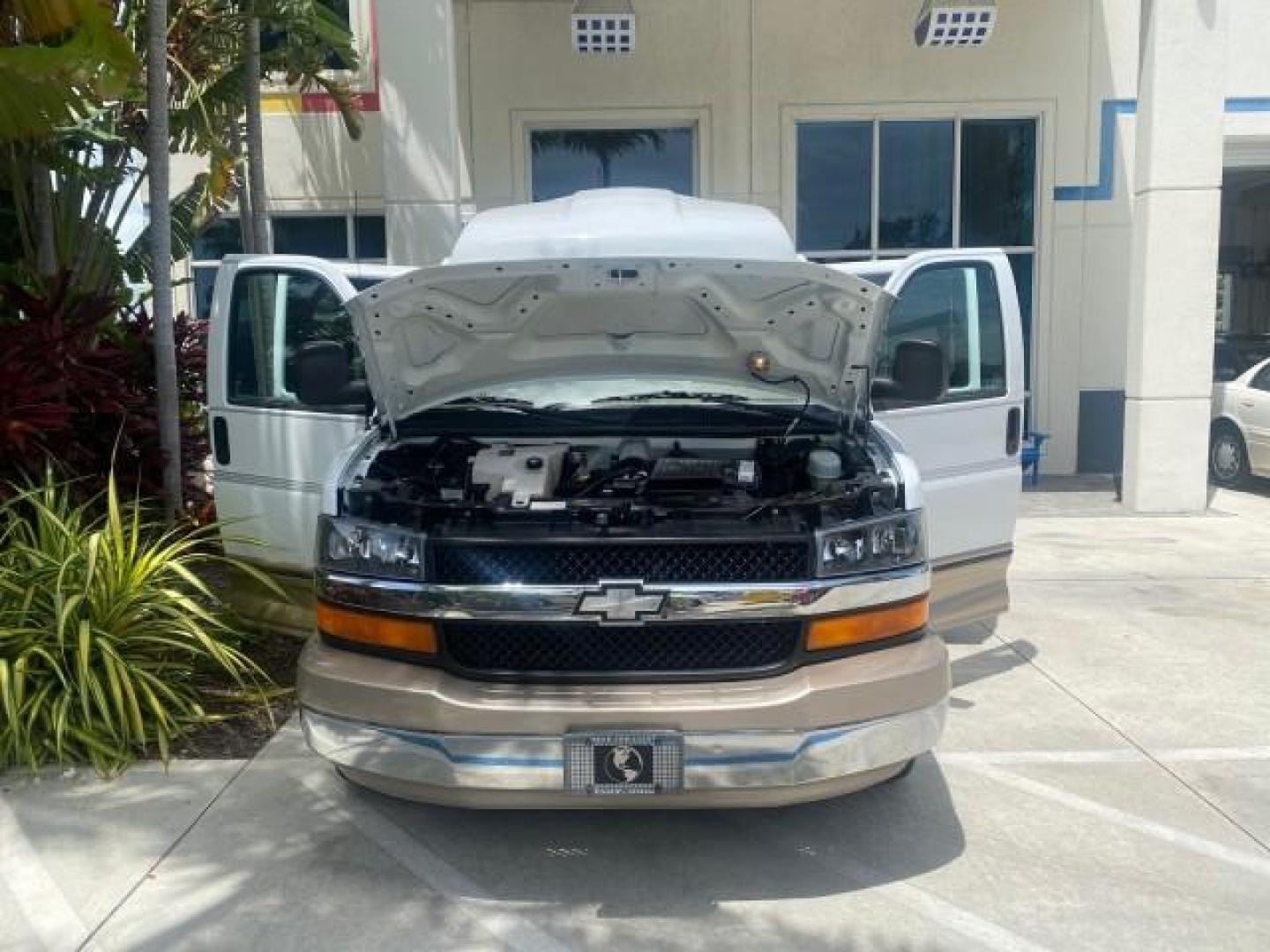 2003 Summit White /Medium Pewter Chevrolet Express HI TOP CONVERSION EXPLOR LOW MILES 55,452 (1GBFG15T331) with an 5.3L Vortec 5300 V8 SFI Engine engine, Automatic transmission, located at 4701 North Dixie Hwy, Pompano Beach, FL, 33064, (954) 422-2889, 26.240938, -80.123474 - OUR WEBPAGE FLORIDACARS1.COM HAS OVER 100 PHOTOS AND FREE CARFAX LINK OVER $ 90,000 NEW 2003 CHEVROLET EXPRESS G1500 LIMITED EXPLORER HI TOP CONVERSION VIN: 1GBFG15T331235672 1 G B F G 1 5 T 3 3 1 2 3 5 6 7 2 VAN 5.3L V8 F OHV GASOLINE REAR WHEEL DRIVE Top Features Alloy Wheels Conversion Van Fold-A - Photo#16