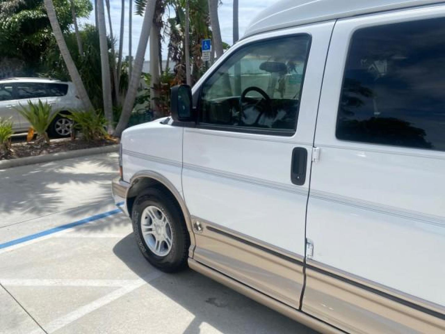 2003 Summit White /Medium Pewter Chevrolet Express HI TOP CONVERSION EXPLOR LOW MILES 55,452 (1GBFG15T331) with an 5.3L Vortec 5300 V8 SFI Engine engine, Automatic transmission, located at 4701 North Dixie Hwy, Pompano Beach, FL, 33064, (954) 422-2889, 26.240938, -80.123474 - OUR WEBPAGE FLORIDACARS1.COM HAS OVER 100 PHOTOS AND FREE CARFAX LINK OVER $ 90,000 NEW 2003 CHEVROLET EXPRESS G1500 LIMITED EXPLORER HI TOP CONVERSION VIN: 1GBFG15T331235672 1 G B F G 1 5 T 3 3 1 2 3 5 6 7 2 VAN 5.3L V8 F OHV GASOLINE REAR WHEEL DRIVE Top Features Alloy Wheels Conversion Van Fold-A - Photo#27