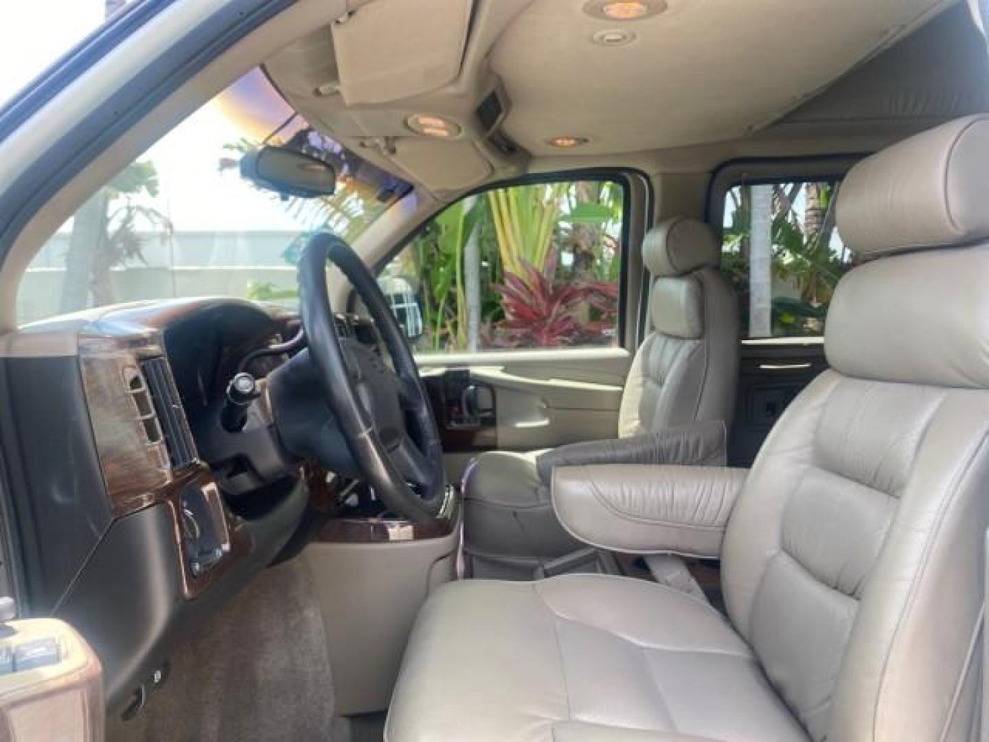 2003 Summit White /Medium Pewter Chevrolet Express HI TOP CONVERSION EXPLOR LOW MILES 55,452 (1GBFG15T331) with an 5.3L Vortec 5300 V8 SFI Engine engine, Automatic transmission, located at 4701 North Dixie Hwy, Pompano Beach, FL, 33064, (954) 422-2889, 26.240938, -80.123474 - OUR WEBPAGE FLORIDACARS1.COM HAS OVER 100 PHOTOS AND FREE CARFAX LINK OVER $ 90,000 NEW 2003 CHEVROLET EXPRESS G1500 LIMITED EXPLORER HI TOP CONVERSION VIN: 1GBFG15T331235672 1 G B F G 1 5 T 3 3 1 2 3 5 6 7 2 VAN 5.3L V8 F OHV GASOLINE REAR WHEEL DRIVE Top Features Alloy Wheels Conversion Van Fold-A - Photo#34