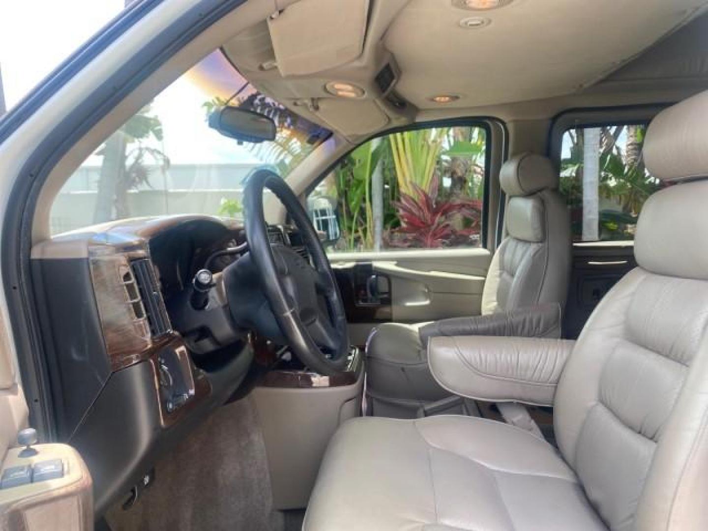 2003 Summit White /Medium Pewter Chevrolet Express HI TOP CONVERSION EXPLOR LOW MILES 55,452 (1GBFG15T331) with an 5.3L Vortec 5300 V8 SFI Engine engine, Automatic transmission, located at 4701 North Dixie Hwy, Pompano Beach, FL, 33064, (954) 422-2889, 26.240938, -80.123474 - OUR WEBPAGE FLORIDACARS1.COM HAS OVER 100 PHOTOS AND FREE CARFAX LINK OVER $ 90,000 NEW 2003 CHEVROLET EXPRESS G1500 LIMITED EXPLORER HI TOP CONVERSION VIN: 1GBFG15T331235672 1 G B F G 1 5 T 3 3 1 2 3 5 6 7 2 VAN 5.3L V8 F OHV GASOLINE REAR WHEEL DRIVE Top Features Alloy Wheels Conversion Van Fold-A - Photo#35