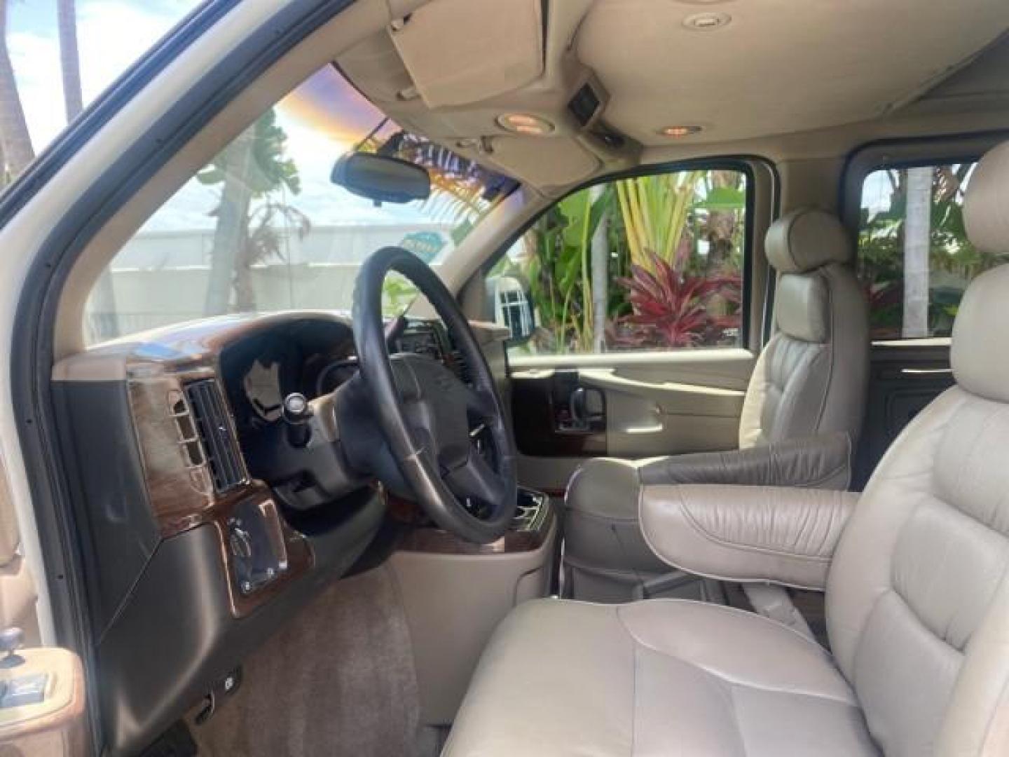 2003 Summit White /Medium Pewter Chevrolet Express HI TOP CONVERSION EXPLOR LOW MILES 55,452 (1GBFG15T331) with an 5.3L Vortec 5300 V8 SFI Engine engine, Automatic transmission, located at 4701 North Dixie Hwy, Pompano Beach, FL, 33064, (954) 422-2889, 26.240938, -80.123474 - OUR WEBPAGE FLORIDACARS1.COM HAS OVER 100 PHOTOS AND FREE CARFAX LINK OVER $ 90,000 NEW 2003 CHEVROLET EXPRESS G1500 LIMITED EXPLORER HI TOP CONVERSION VIN: 1GBFG15T331235672 1 G B F G 1 5 T 3 3 1 2 3 5 6 7 2 VAN 5.3L V8 F OHV GASOLINE REAR WHEEL DRIVE Top Features Alloy Wheels Conversion Van Fold-A - Photo#36