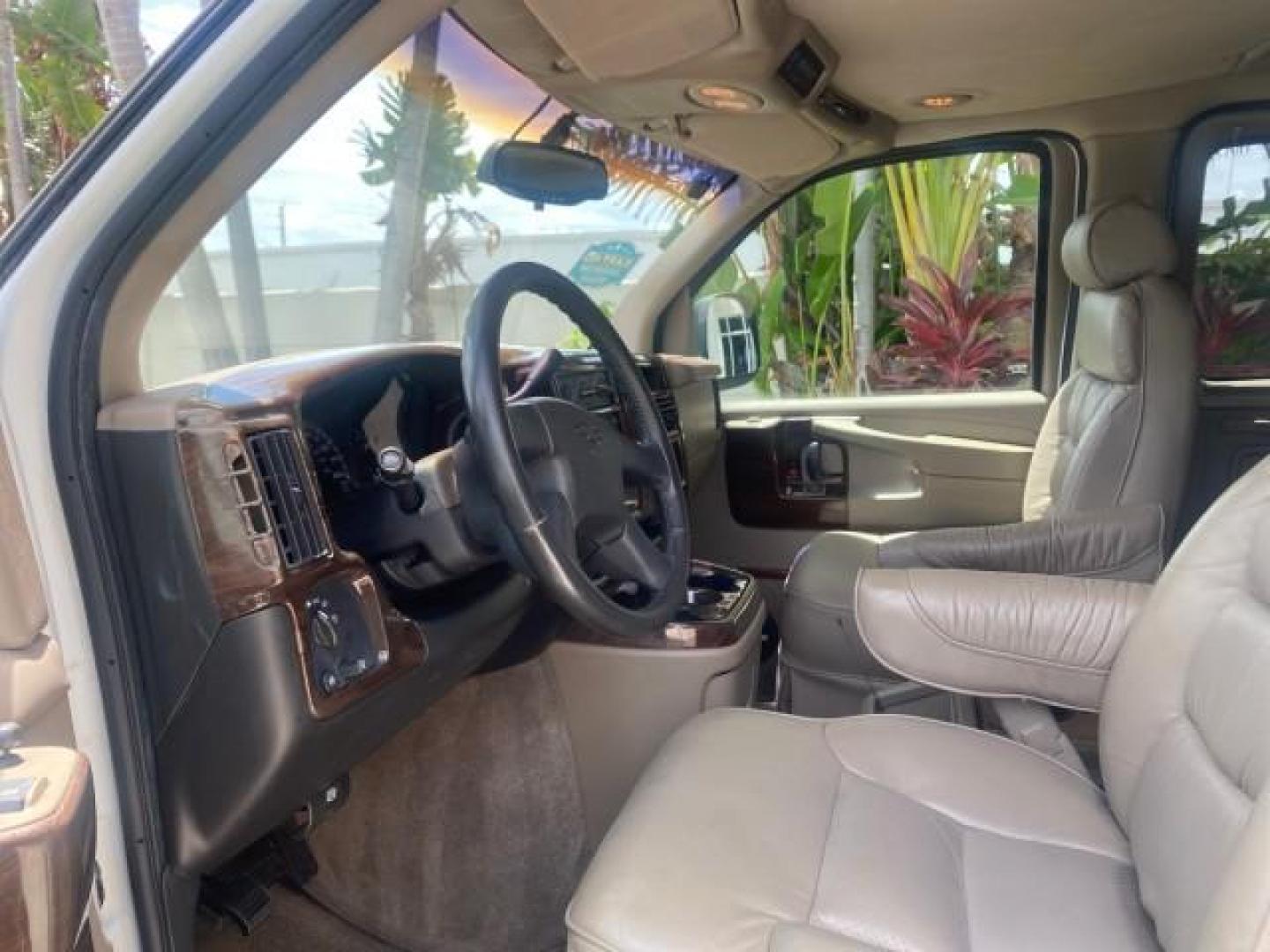2003 Summit White /Medium Pewter Chevrolet Express HI TOP CONVERSION EXPLOR LOW MILES 55,452 (1GBFG15T331) with an 5.3L Vortec 5300 V8 SFI Engine engine, Automatic transmission, located at 4701 North Dixie Hwy, Pompano Beach, FL, 33064, (954) 422-2889, 26.240938, -80.123474 - OUR WEBPAGE FLORIDACARS1.COM HAS OVER 100 PHOTOS AND FREE CARFAX LINK OVER $ 90,000 NEW 2003 CHEVROLET EXPRESS G1500 LIMITED EXPLORER HI TOP CONVERSION VIN: 1GBFG15T331235672 1 G B F G 1 5 T 3 3 1 2 3 5 6 7 2 VAN 5.3L V8 F OHV GASOLINE REAR WHEEL DRIVE Top Features Alloy Wheels Conversion Van Fold-A - Photo#37