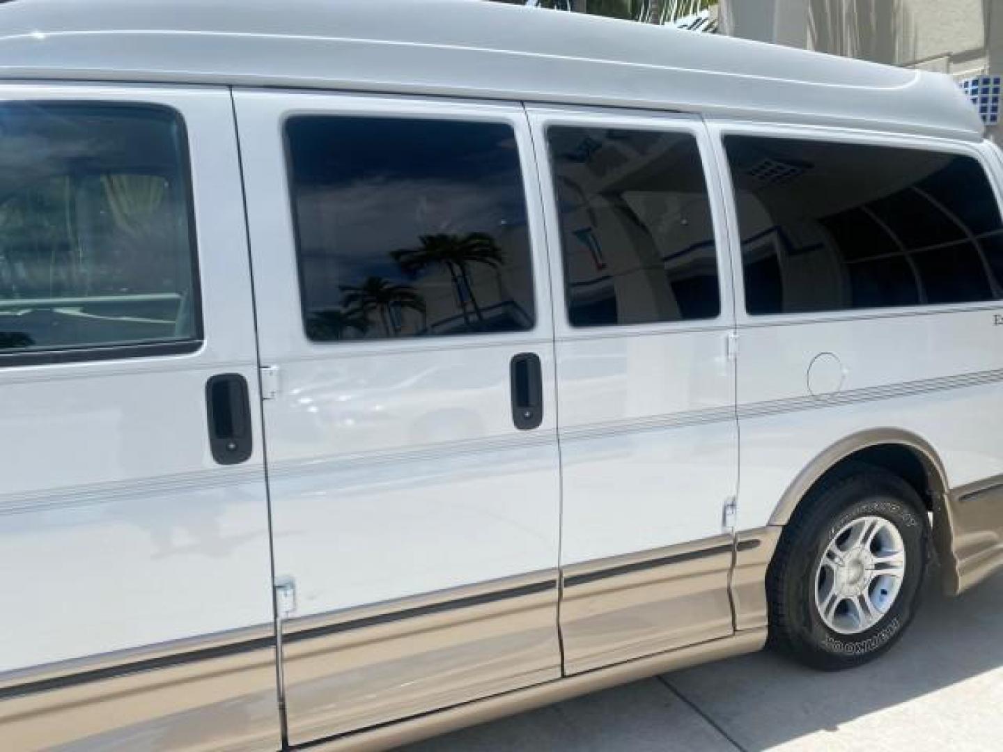 2003 Summit White /Medium Pewter Chevrolet Express HI TOP CONVERSION EXPLOR LOW MILES 55,452 (1GBFG15T331) with an 5.3L Vortec 5300 V8 SFI Engine engine, Automatic transmission, located at 4701 North Dixie Hwy, Pompano Beach, FL, 33064, (954) 422-2889, 26.240938, -80.123474 - OUR WEBPAGE FLORIDACARS1.COM HAS OVER 100 PHOTOS AND FREE CARFAX LINK OVER $ 90,000 NEW 2003 CHEVROLET EXPRESS G1500 LIMITED EXPLORER HI TOP CONVERSION VIN: 1GBFG15T331235672 1 G B F G 1 5 T 3 3 1 2 3 5 6 7 2 VAN 5.3L V8 F OHV GASOLINE REAR WHEEL DRIVE Top Features Alloy Wheels Conversion Van Fold-A - Photo#57