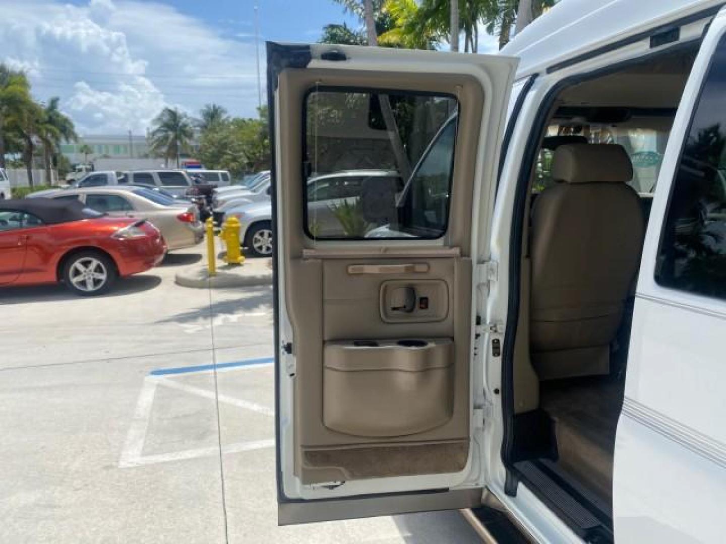 2003 Summit White /Medium Pewter Chevrolet Express HI TOP CONVERSION EXPLOR LOW MILES 55,452 (1GBFG15T331) with an 5.3L Vortec 5300 V8 SFI Engine engine, Automatic transmission, located at 4701 North Dixie Hwy, Pompano Beach, FL, 33064, (954) 422-2889, 26.240938, -80.123474 - OUR WEBPAGE FLORIDACARS1.COM HAS OVER 100 PHOTOS AND FREE CARFAX LINK OVER $ 90,000 NEW 2003 CHEVROLET EXPRESS G1500 LIMITED EXPLORER HI TOP CONVERSION VIN: 1GBFG15T331235672 1 G B F G 1 5 T 3 3 1 2 3 5 6 7 2 VAN 5.3L V8 F OHV GASOLINE REAR WHEEL DRIVE Top Features Alloy Wheels Conversion Van Fold-A - Photo#58