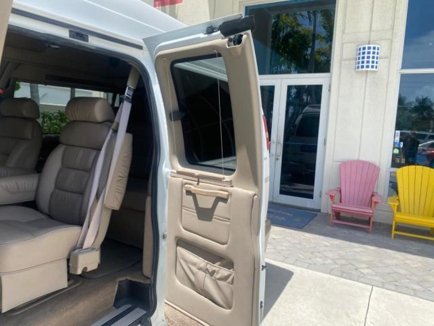 2003 Summit White /Medium Pewter Chevrolet Express HI TOP CONVERSION EXPLOR LOW MILES 55,452 (1GBFG15T331) with an 5.3L Vortec 5300 V8 SFI Engine engine, Automatic transmission, located at 4701 North Dixie Hwy, Pompano Beach, FL, 33064, (954) 422-2889, 26.240938, -80.123474 - OUR WEBPAGE FLORIDACARS1.COM HAS OVER 100 PHOTOS AND FREE CARFAX LINK OVER $ 90,000 NEW 2003 CHEVROLET EXPRESS G1500 LIMITED EXPLORER HI TOP CONVERSION VIN: 1GBFG15T331235672 1 G B F G 1 5 T 3 3 1 2 3 5 6 7 2 VAN 5.3L V8 F OHV GASOLINE REAR WHEEL DRIVE Top Features Alloy Wheels Conversion Van Fold-A - Photo#60
