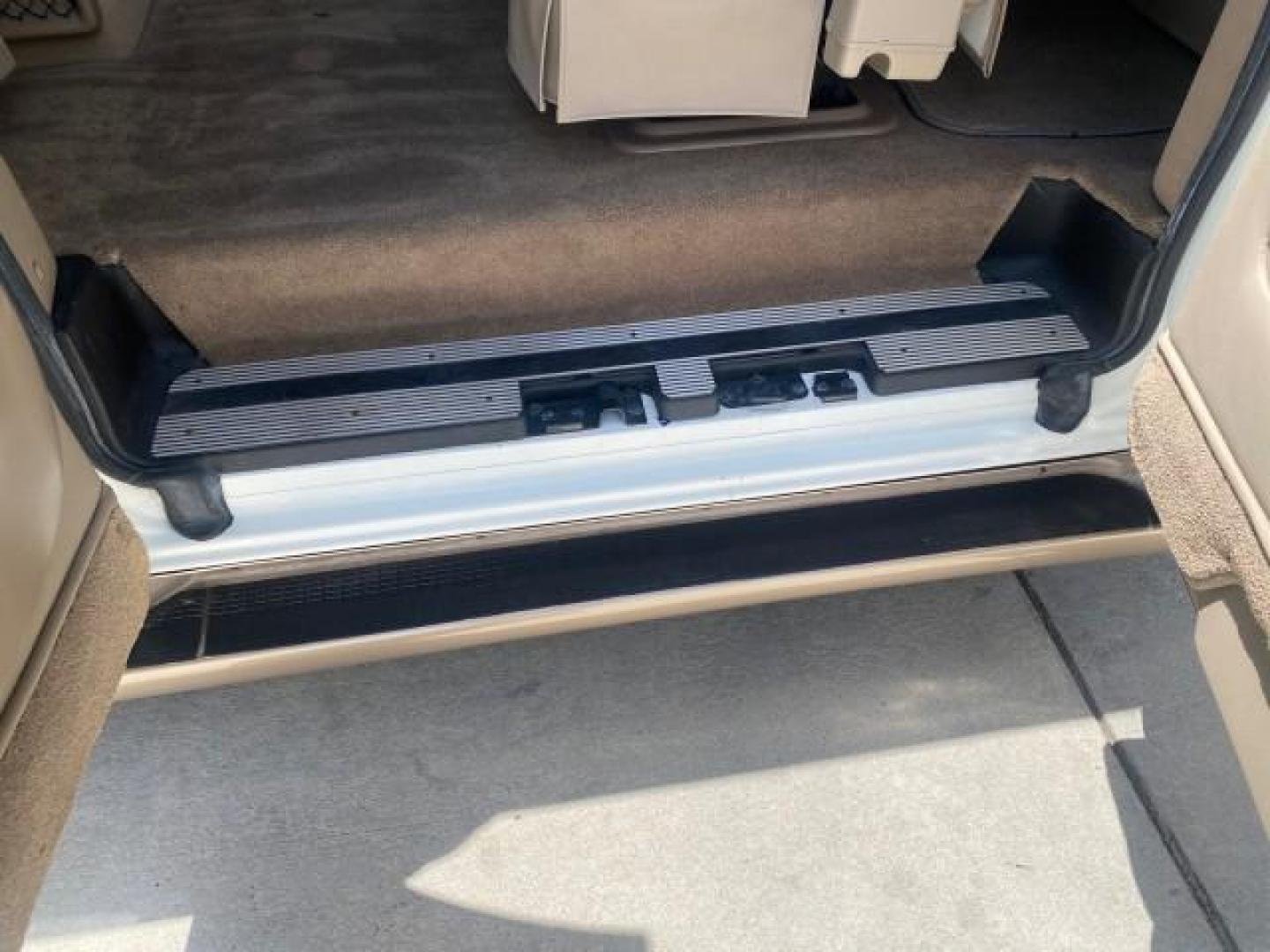 2003 Summit White /Medium Pewter Chevrolet Express HI TOP CONVERSION EXPLOR LOW MILES 55,452 (1GBFG15T331) with an 5.3L Vortec 5300 V8 SFI Engine engine, Automatic transmission, located at 4701 North Dixie Hwy, Pompano Beach, FL, 33064, (954) 422-2889, 26.240938, -80.123474 - OUR WEBPAGE FLORIDACARS1.COM HAS OVER 100 PHOTOS AND FREE CARFAX LINK OVER $ 90,000 NEW 2003 CHEVROLET EXPRESS G1500 LIMITED EXPLORER HI TOP CONVERSION VIN: 1GBFG15T331235672 1 G B F G 1 5 T 3 3 1 2 3 5 6 7 2 VAN 5.3L V8 F OHV GASOLINE REAR WHEEL DRIVE Top Features Alloy Wheels Conversion Van Fold-A - Photo#62