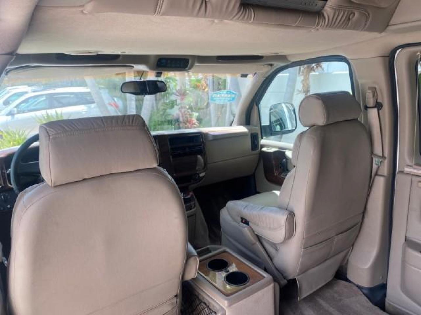 2003 Summit White /Medium Pewter Chevrolet Express HI TOP CONVERSION EXPLOR LOW MILES 55,452 (1GBFG15T331) with an 5.3L Vortec 5300 V8 SFI Engine engine, Automatic transmission, located at 4701 North Dixie Hwy, Pompano Beach, FL, 33064, (954) 422-2889, 26.240938, -80.123474 - OUR WEBPAGE FLORIDACARS1.COM HAS OVER 100 PHOTOS AND FREE CARFAX LINK OVER $ 90,000 NEW 2003 CHEVROLET EXPRESS G1500 LIMITED EXPLORER HI TOP CONVERSION VIN: 1GBFG15T331235672 1 G B F G 1 5 T 3 3 1 2 3 5 6 7 2 VAN 5.3L V8 F OHV GASOLINE REAR WHEEL DRIVE Top Features Alloy Wheels Conversion Van Fold-A - Photo#68