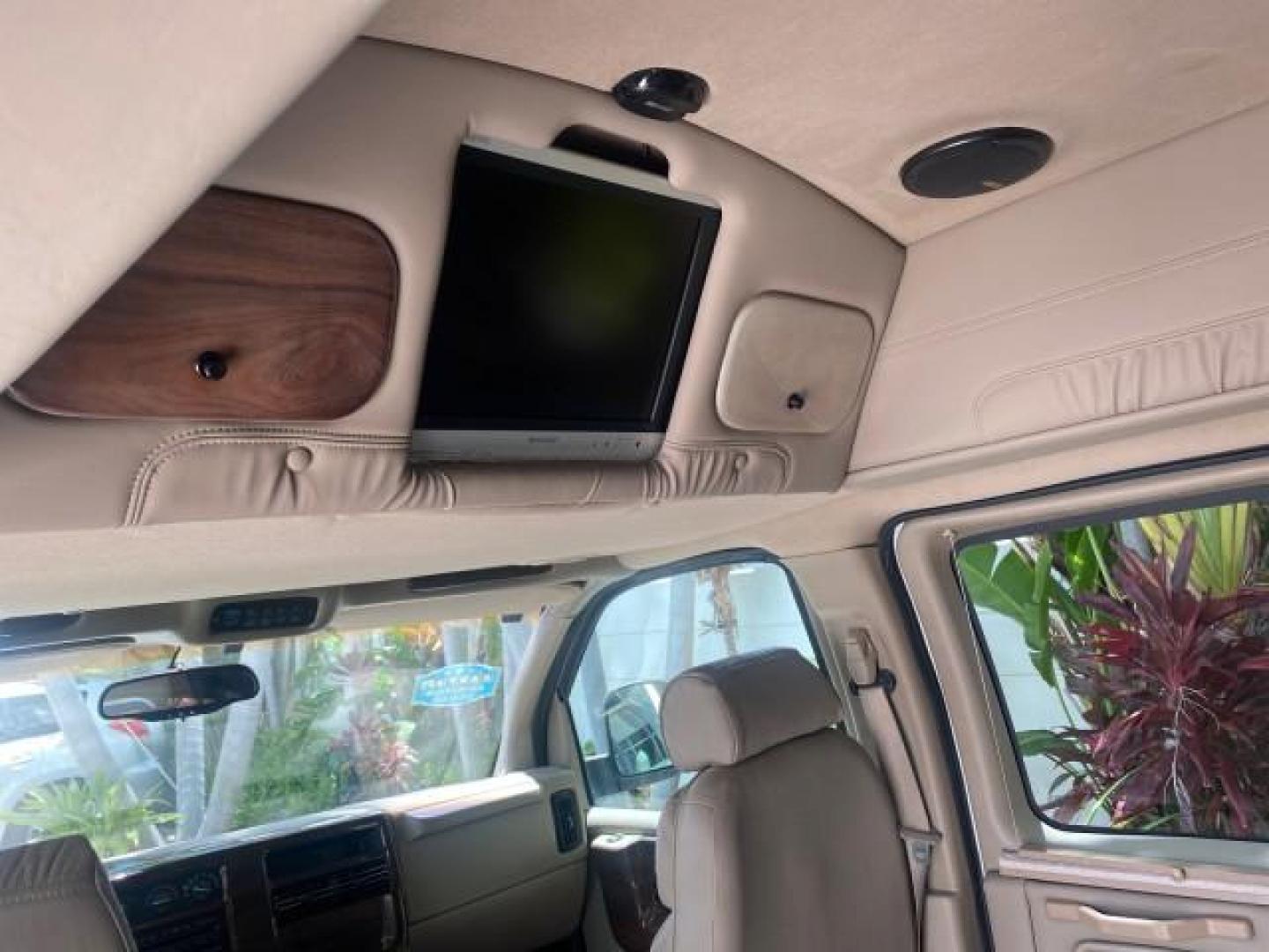 2003 Summit White /Medium Pewter Chevrolet Express HI TOP CONVERSION EXPLOR LOW MILES 55,452 (1GBFG15T331) with an 5.3L Vortec 5300 V8 SFI Engine engine, Automatic transmission, located at 4701 North Dixie Hwy, Pompano Beach, FL, 33064, (954) 422-2889, 26.240938, -80.123474 - OUR WEBPAGE FLORIDACARS1.COM HAS OVER 100 PHOTOS AND FREE CARFAX LINK OVER $ 90,000 NEW 2003 CHEVROLET EXPRESS G1500 LIMITED EXPLORER HI TOP CONVERSION VIN: 1GBFG15T331235672 1 G B F G 1 5 T 3 3 1 2 3 5 6 7 2 VAN 5.3L V8 F OHV GASOLINE REAR WHEEL DRIVE Top Features Alloy Wheels Conversion Van Fold-A - Photo#69