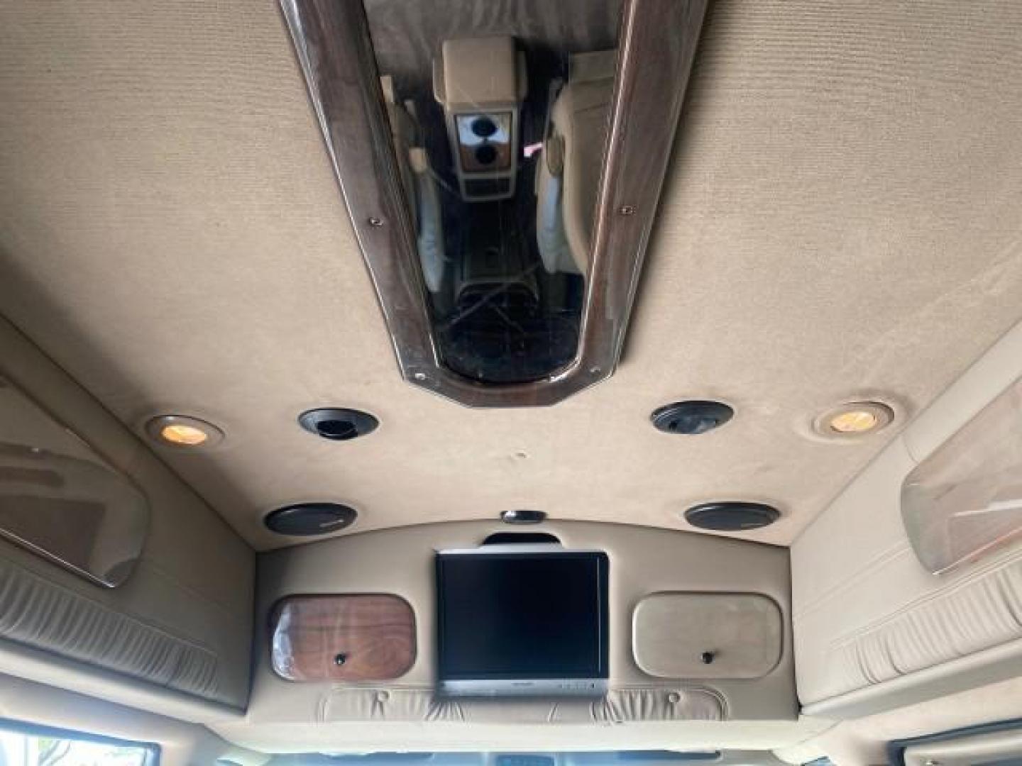 2003 Summit White /Medium Pewter Chevrolet Express HI TOP CONVERSION EXPLOR LOW MILES 55,452 (1GBFG15T331) with an 5.3L Vortec 5300 V8 SFI Engine engine, Automatic transmission, located at 4701 North Dixie Hwy, Pompano Beach, FL, 33064, (954) 422-2889, 26.240938, -80.123474 - OUR WEBPAGE FLORIDACARS1.COM HAS OVER 100 PHOTOS AND FREE CARFAX LINK OVER $ 90,000 NEW 2003 CHEVROLET EXPRESS G1500 LIMITED EXPLORER HI TOP CONVERSION VIN: 1GBFG15T331235672 1 G B F G 1 5 T 3 3 1 2 3 5 6 7 2 VAN 5.3L V8 F OHV GASOLINE REAR WHEEL DRIVE Top Features Alloy Wheels Conversion Van Fold-A - Photo#72