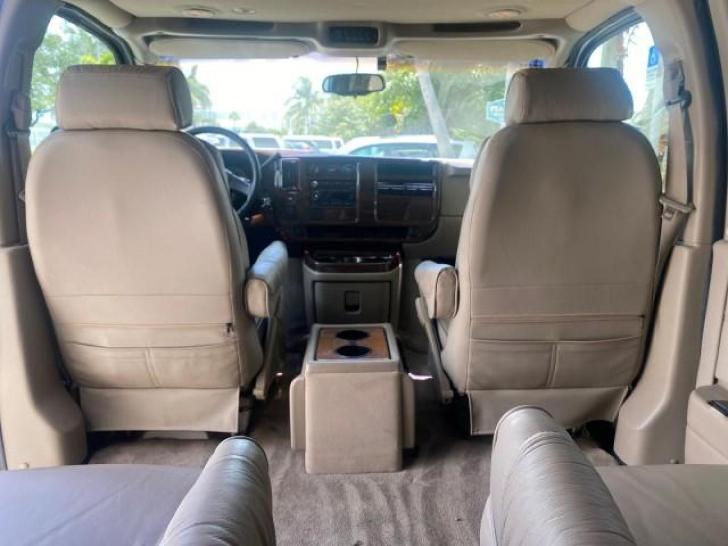 2003 Summit White /Medium Pewter Chevrolet Express HI TOP CONVERSION EXPLOR LOW MILES 55,452 (1GBFG15T331) with an 5.3L Vortec 5300 V8 SFI Engine engine, Automatic transmission, located at 4701 North Dixie Hwy, Pompano Beach, FL, 33064, (954) 422-2889, 26.240938, -80.123474 - OUR WEBPAGE FLORIDACARS1.COM HAS OVER 100 PHOTOS AND FREE CARFAX LINK OVER $ 90,000 NEW 2003 CHEVROLET EXPRESS G1500 LIMITED EXPLORER HI TOP CONVERSION VIN: 1GBFG15T331235672 1 G B F G 1 5 T 3 3 1 2 3 5 6 7 2 VAN 5.3L V8 F OHV GASOLINE REAR WHEEL DRIVE Top Features Alloy Wheels Conversion Van Fold-A - Photo#77
