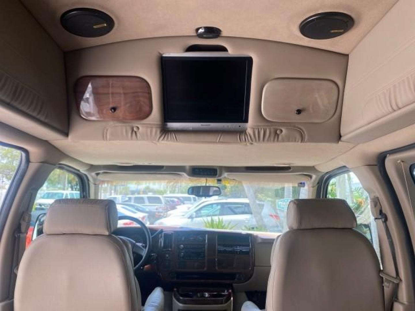2003 Summit White /Medium Pewter Chevrolet Express HI TOP CONVERSION EXPLOR LOW MILES 55,452 (1GBFG15T331) with an 5.3L Vortec 5300 V8 SFI Engine engine, Automatic transmission, located at 4701 North Dixie Hwy, Pompano Beach, FL, 33064, (954) 422-2889, 26.240938, -80.123474 - OUR WEBPAGE FLORIDACARS1.COM HAS OVER 100 PHOTOS AND FREE CARFAX LINK OVER $ 90,000 NEW 2003 CHEVROLET EXPRESS G1500 LIMITED EXPLORER HI TOP CONVERSION VIN: 1GBFG15T331235672 1 G B F G 1 5 T 3 3 1 2 3 5 6 7 2 VAN 5.3L V8 F OHV GASOLINE REAR WHEEL DRIVE Top Features Alloy Wheels Conversion Van Fold-A - Photo#78