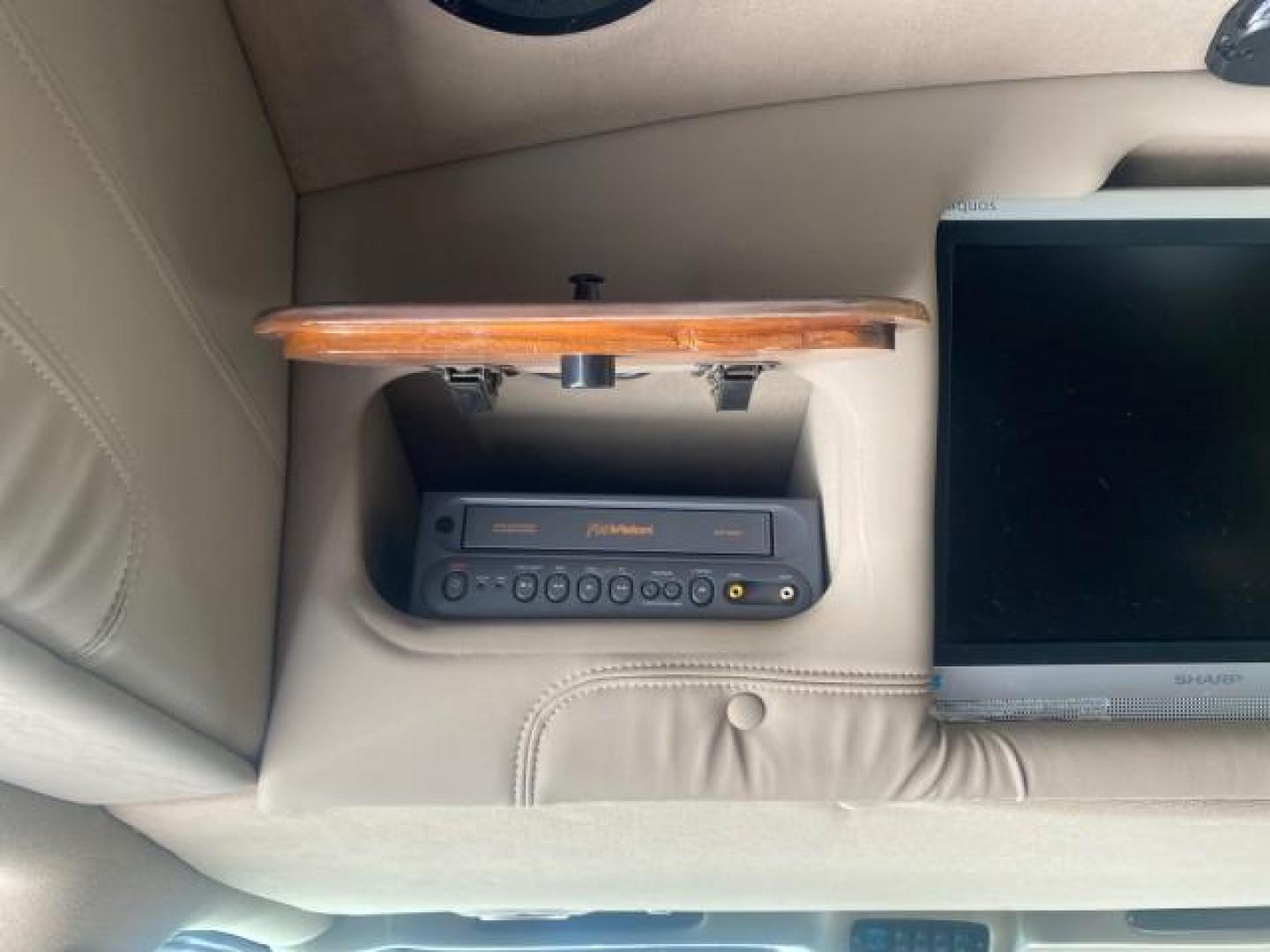 2003 Summit White /Medium Pewter Chevrolet Express HI TOP CONVERSION EXPLOR LOW MILES 55,452 (1GBFG15T331) with an 5.3L Vortec 5300 V8 SFI Engine engine, Automatic transmission, located at 4701 North Dixie Hwy, Pompano Beach, FL, 33064, (954) 422-2889, 26.240938, -80.123474 - OUR WEBPAGE FLORIDACARS1.COM HAS OVER 100 PHOTOS AND FREE CARFAX LINK OVER $ 90,000 NEW 2003 CHEVROLET EXPRESS G1500 LIMITED EXPLORER HI TOP CONVERSION VIN: 1GBFG15T331235672 1 G B F G 1 5 T 3 3 1 2 3 5 6 7 2 VAN 5.3L V8 F OHV GASOLINE REAR WHEEL DRIVE Top Features Alloy Wheels Conversion Van Fold-A - Photo#79