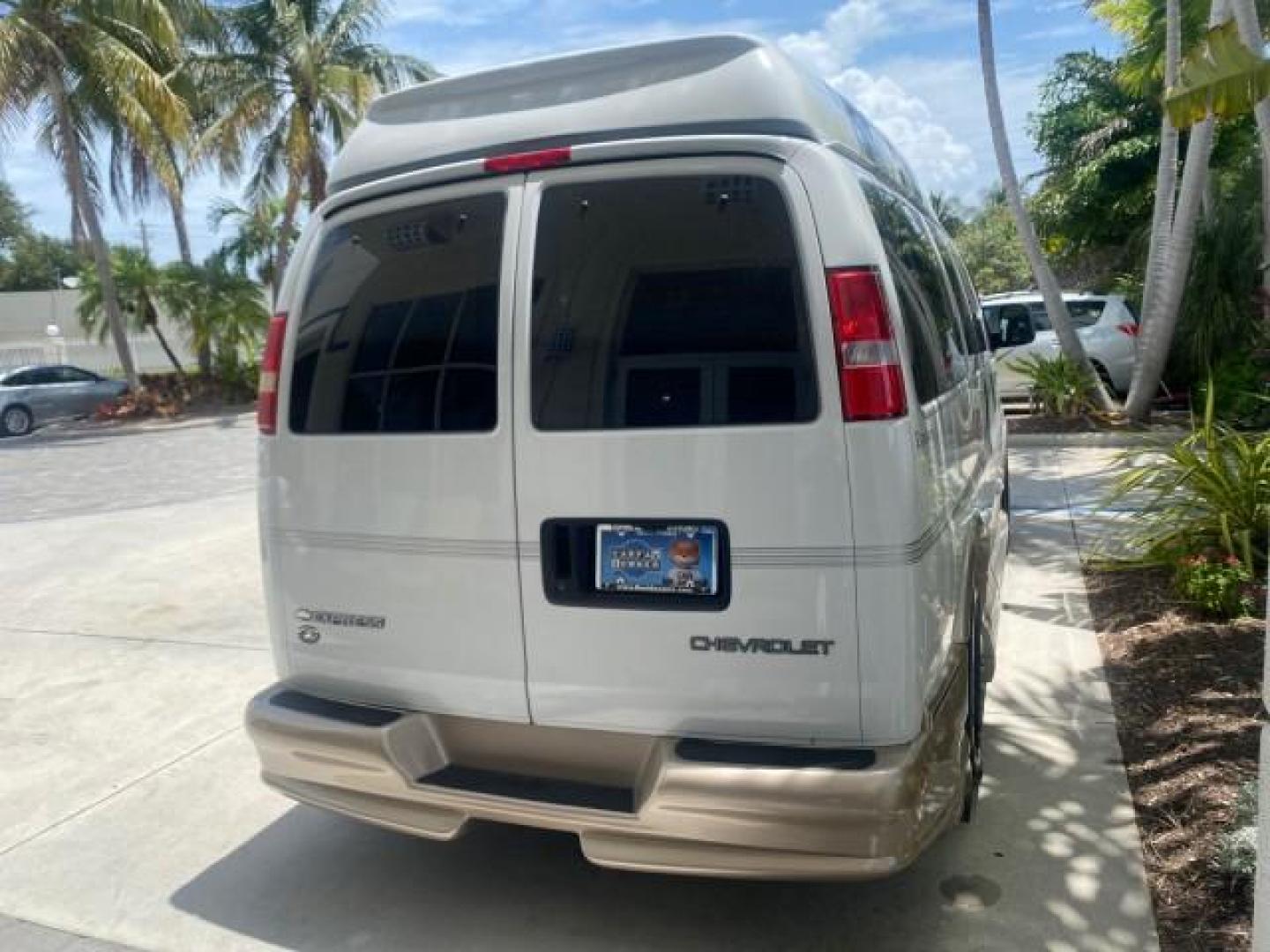 2003 Summit White /Medium Pewter Chevrolet Express HI TOP CONVERSION EXPLOR LOW MILES 55,452 (1GBFG15T331) with an 5.3L Vortec 5300 V8 SFI Engine engine, Automatic transmission, located at 4701 North Dixie Hwy, Pompano Beach, FL, 33064, (954) 422-2889, 26.240938, -80.123474 - OUR WEBPAGE FLORIDACARS1.COM HAS OVER 100 PHOTOS AND FREE CARFAX LINK OVER $ 90,000 NEW 2003 CHEVROLET EXPRESS G1500 LIMITED EXPLORER HI TOP CONVERSION VIN: 1GBFG15T331235672 1 G B F G 1 5 T 3 3 1 2 3 5 6 7 2 VAN 5.3L V8 F OHV GASOLINE REAR WHEEL DRIVE Top Features Alloy Wheels Conversion Van Fold-A - Photo#89