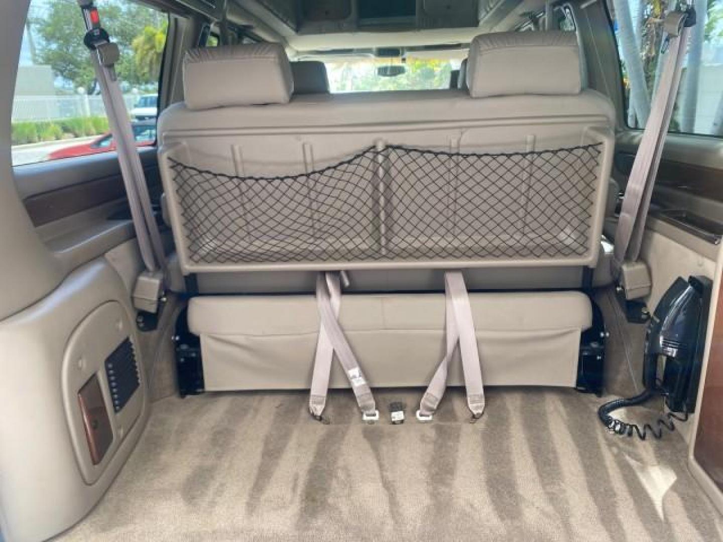 2003 Summit White /Medium Pewter Chevrolet Express HI TOP CONVERSION EXPLOR LOW MILES 55,452 (1GBFG15T331) with an 5.3L Vortec 5300 V8 SFI Engine engine, Automatic transmission, located at 4701 North Dixie Hwy, Pompano Beach, FL, 33064, (954) 422-2889, 26.240938, -80.123474 - OUR WEBPAGE FLORIDACARS1.COM HAS OVER 100 PHOTOS AND FREE CARFAX LINK OVER $ 90,000 NEW 2003 CHEVROLET EXPRESS G1500 LIMITED EXPLORER HI TOP CONVERSION VIN: 1GBFG15T331235672 1 G B F G 1 5 T 3 3 1 2 3 5 6 7 2 VAN 5.3L V8 F OHV GASOLINE REAR WHEEL DRIVE Top Features Alloy Wheels Conversion Van Fold-A - Photo#94