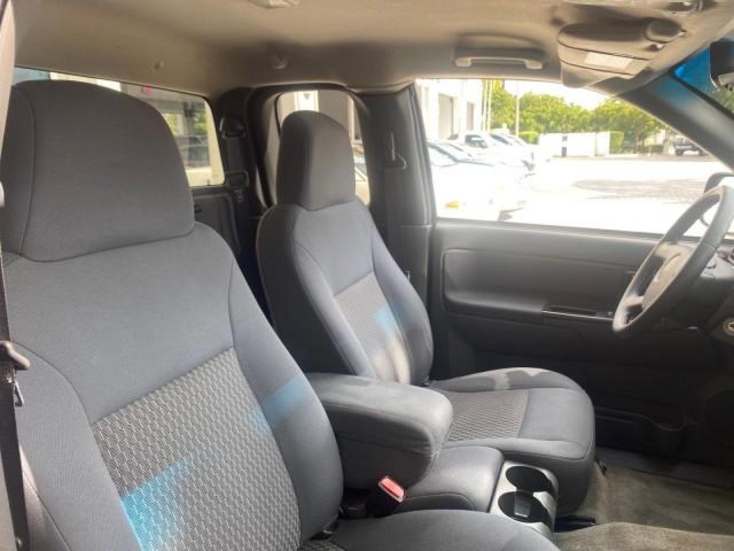 2006 Black /Very Dark Pewter Chevrolet Colorado LT 4WD LOW MILES 74,382 (1GCDT196768) with an 3.5L DOHC 5-Cyl MFI Engine engine, Automatic transmission, located at 4701 North Dixie Hwy, Pompano Beach, FL, 33064, (954) 422-2889, 26.240938, -80.123474 - OUR WEBPAGE FLORIDACARS1.COM HAS OVER 100 PHOTOS AND FREE CARFAX LINK 2006 CHEVROLET COLORADO LT VIN: 1GCDT196768275459 1 G C D T 1 9 6 7 6 8 2 7 5 4 5 9 4 DOOR EXTENDED CAB PICKUP 3.5L I5 F GASOLINE REAR WHEEL DRIVE W/ 4X4 Top Features 4WD/AWD Bed Cover Cloth Seats Running Boards Basic Features ABS - Photo#12