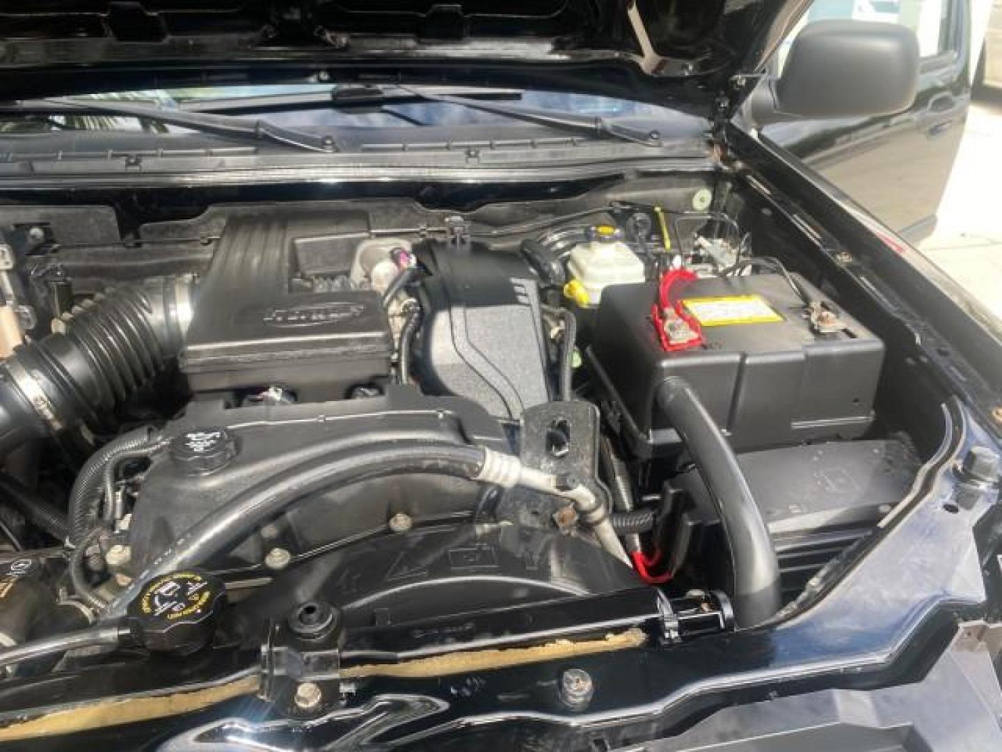 2006 Black /Very Dark Pewter Chevrolet Colorado LT 4WD LOW MILES 74,382 (1GCDT196768) with an 3.5L DOHC 5-Cyl MFI Engine engine, Automatic transmission, located at 4701 North Dixie Hwy, Pompano Beach, FL, 33064, (954) 422-2889, 26.240938, -80.123474 - OUR WEBPAGE FLORIDACARS1.COM HAS OVER 100 PHOTOS AND FREE CARFAX LINK 2006 CHEVROLET COLORADO LT VIN: 1GCDT196768275459 1 G C D T 1 9 6 7 6 8 2 7 5 4 5 9 4 DOOR EXTENDED CAB PICKUP 3.5L I5 F GASOLINE REAR WHEEL DRIVE W/ 4X4 Top Features 4WD/AWD Bed Cover Cloth Seats Running Boards Basic Features ABS - Photo#26