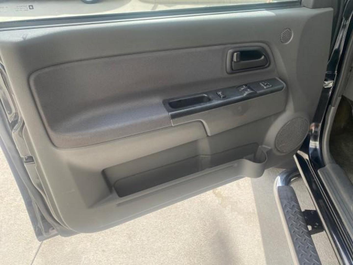 2006 Black /Very Dark Pewter Chevrolet Colorado LT 4WD LOW MILES 74,382 (1GCDT196768) with an 3.5L DOHC 5-Cyl MFI Engine engine, Automatic transmission, located at 4701 North Dixie Hwy, Pompano Beach, FL, 33064, (954) 422-2889, 26.240938, -80.123474 - OUR WEBPAGE FLORIDACARS1.COM HAS OVER 100 PHOTOS AND FREE CARFAX LINK 2006 CHEVROLET COLORADO LT VIN: 1GCDT196768275459 1 G C D T 1 9 6 7 6 8 2 7 5 4 5 9 4 DOOR EXTENDED CAB PICKUP 3.5L I5 F GASOLINE REAR WHEEL DRIVE W/ 4X4 Top Features 4WD/AWD Bed Cover Cloth Seats Running Boards Basic Features ABS - Photo#32