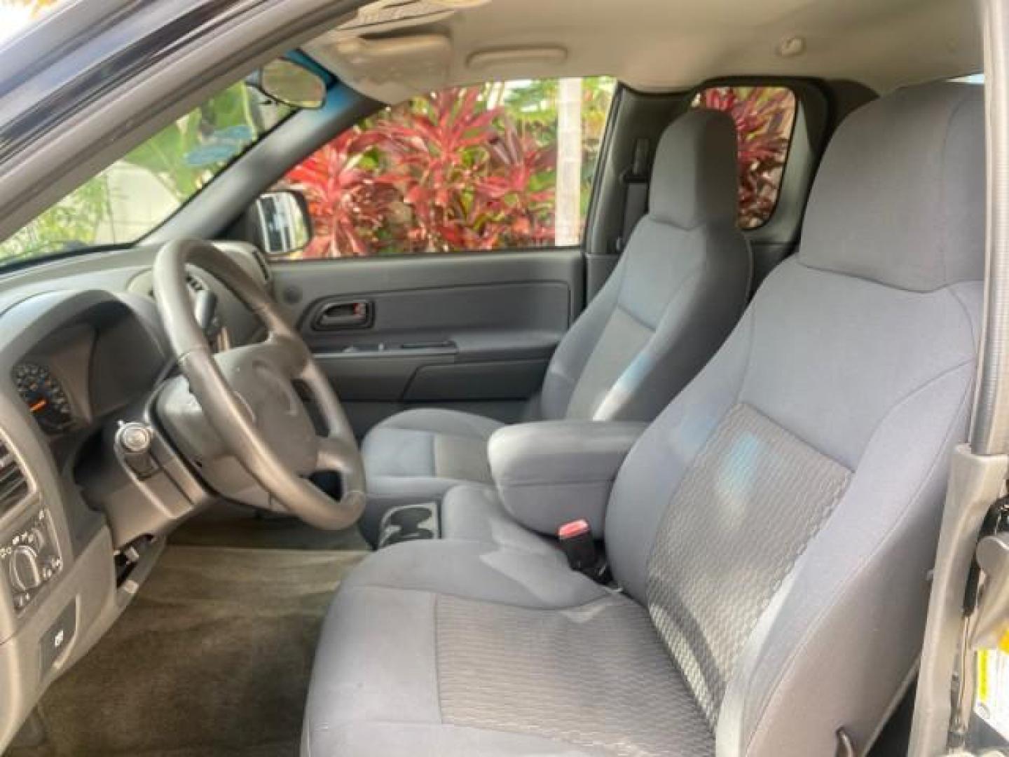 2006 Black /Very Dark Pewter Chevrolet Colorado LT 4WD LOW MILES 74,382 (1GCDT196768) with an 3.5L DOHC 5-Cyl MFI Engine engine, Automatic transmission, located at 4701 North Dixie Hwy, Pompano Beach, FL, 33064, (954) 422-2889, 26.240938, -80.123474 - OUR WEBPAGE FLORIDACARS1.COM HAS OVER 100 PHOTOS AND FREE CARFAX LINK 2006 CHEVROLET COLORADO LT VIN: 1GCDT196768275459 1 G C D T 1 9 6 7 6 8 2 7 5 4 5 9 4 DOOR EXTENDED CAB PICKUP 3.5L I5 F GASOLINE REAR WHEEL DRIVE W/ 4X4 Top Features 4WD/AWD Bed Cover Cloth Seats Running Boards Basic Features ABS - Photo#34