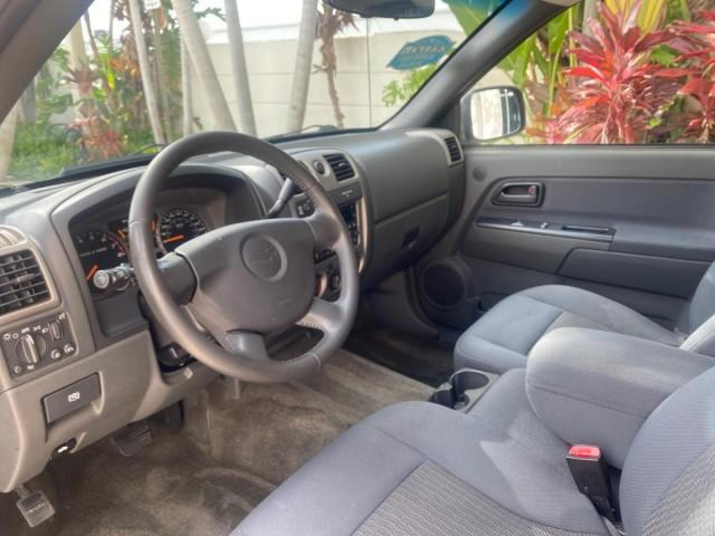 2006 Black /Very Dark Pewter Chevrolet Colorado LT 4WD LOW MILES 74,382 (1GCDT196768) with an 3.5L DOHC 5-Cyl MFI Engine engine, Automatic transmission, located at 4701 North Dixie Hwy, Pompano Beach, FL, 33064, (954) 422-2889, 26.240938, -80.123474 - OUR WEBPAGE FLORIDACARS1.COM HAS OVER 100 PHOTOS AND FREE CARFAX LINK 2006 CHEVROLET COLORADO LT VIN: 1GCDT196768275459 1 G C D T 1 9 6 7 6 8 2 7 5 4 5 9 4 DOOR EXTENDED CAB PICKUP 3.5L I5 F GASOLINE REAR WHEEL DRIVE W/ 4X4 Top Features 4WD/AWD Bed Cover Cloth Seats Running Boards Basic Features ABS - Photo#38