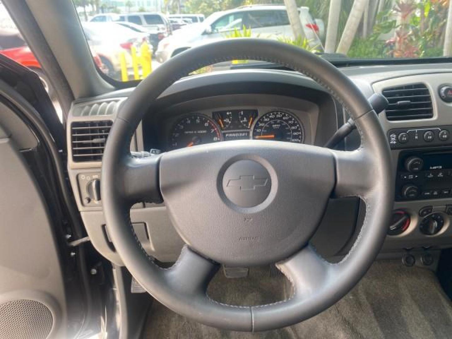 2006 Black /Very Dark Pewter Chevrolet Colorado LT 4WD LOW MILES 74,382 (1GCDT196768) with an 3.5L DOHC 5-Cyl MFI Engine engine, Automatic transmission, located at 4701 North Dixie Hwy, Pompano Beach, FL, 33064, (954) 422-2889, 26.240938, -80.123474 - OUR WEBPAGE FLORIDACARS1.COM HAS OVER 100 PHOTOS AND FREE CARFAX LINK 2006 CHEVROLET COLORADO LT VIN: 1GCDT196768275459 1 G C D T 1 9 6 7 6 8 2 7 5 4 5 9 4 DOOR EXTENDED CAB PICKUP 3.5L I5 F GASOLINE REAR WHEEL DRIVE W/ 4X4 Top Features 4WD/AWD Bed Cover Cloth Seats Running Boards Basic Features ABS - Photo#39
